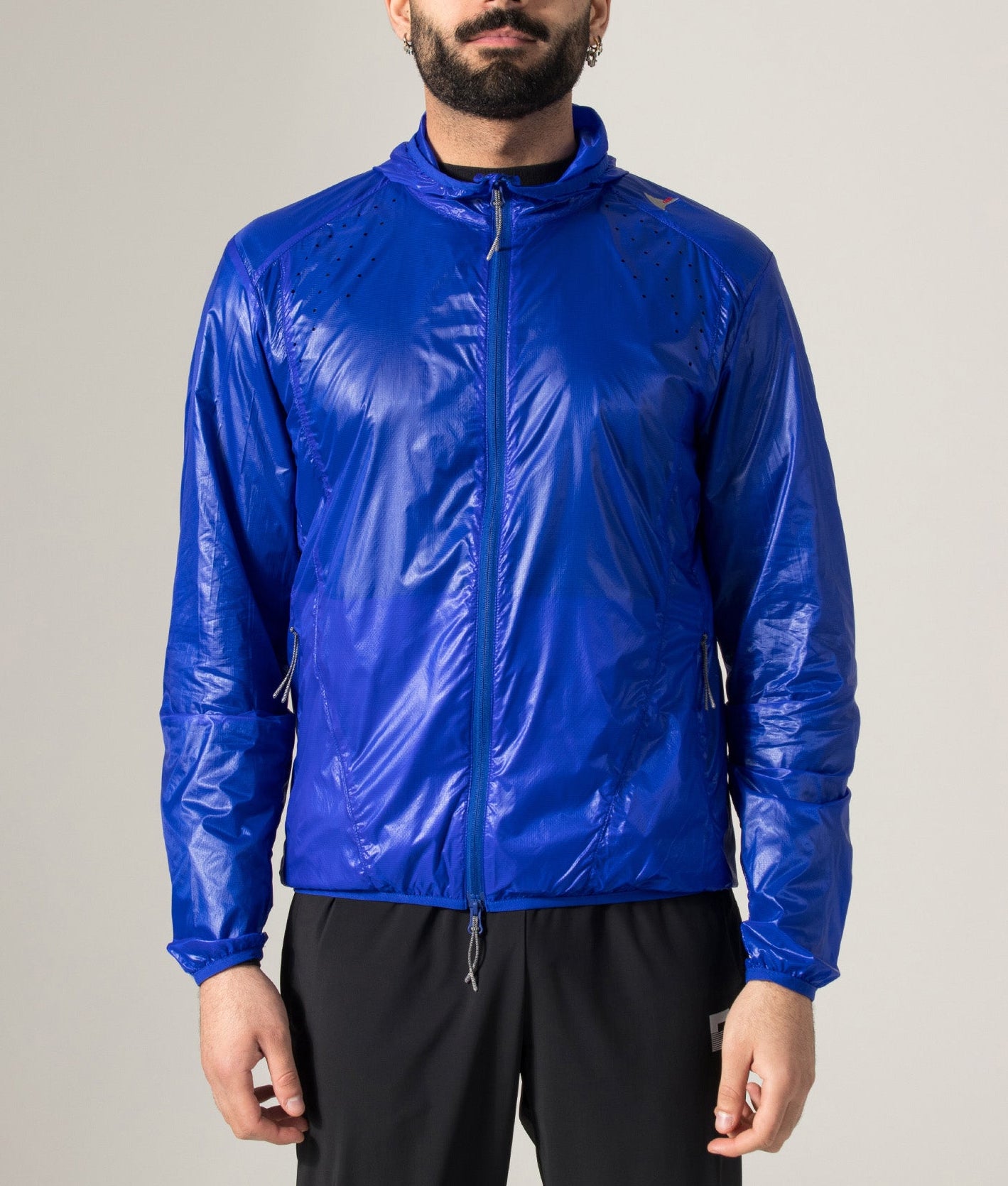 ROA Hue Packable Lightweight Windcheater in Blue at EQVVS Menswear. Model front shot.