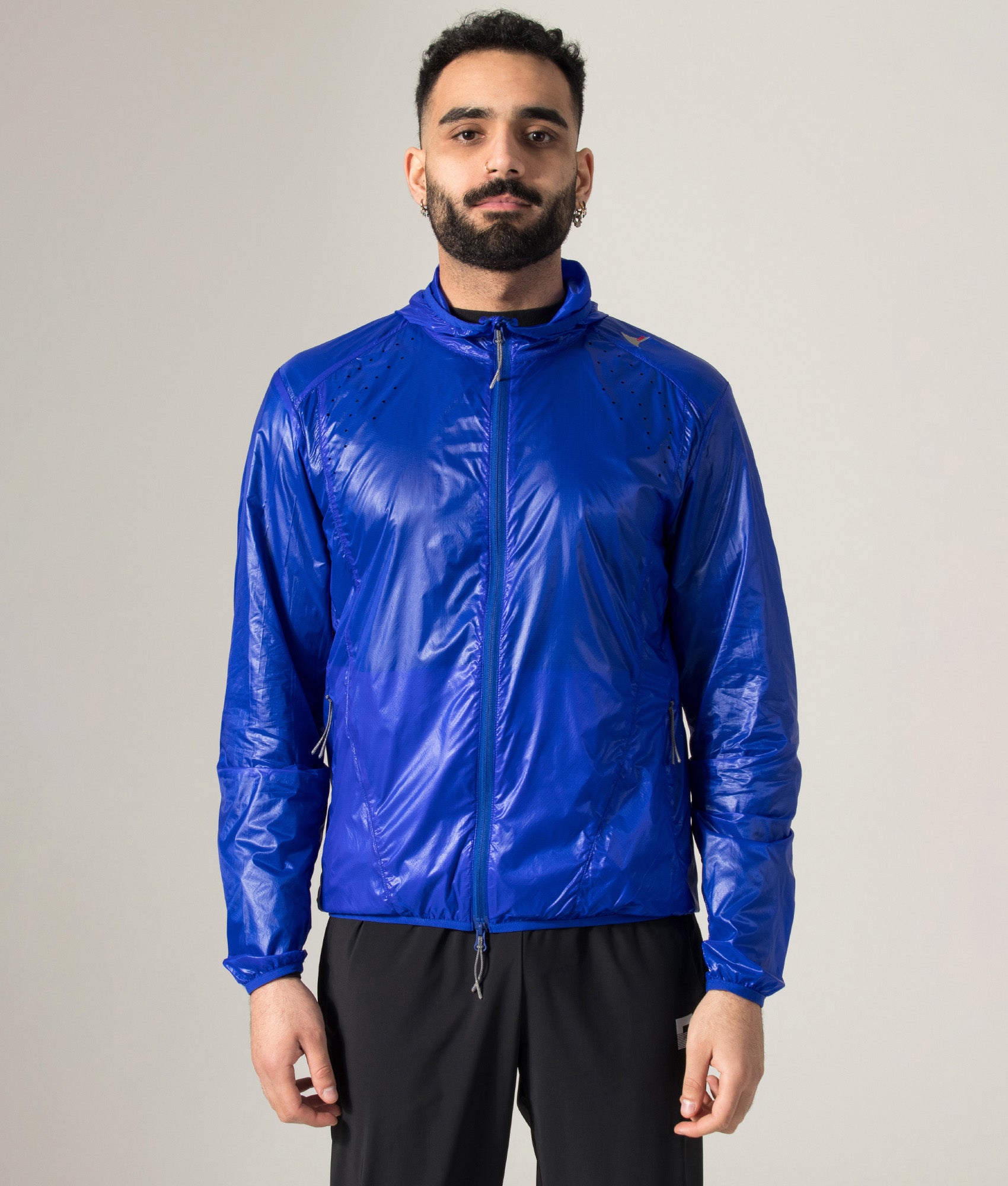 ROA Hue Packable Lightweight Windcheater in Blue at EQVVS Menswear. Model front shot.