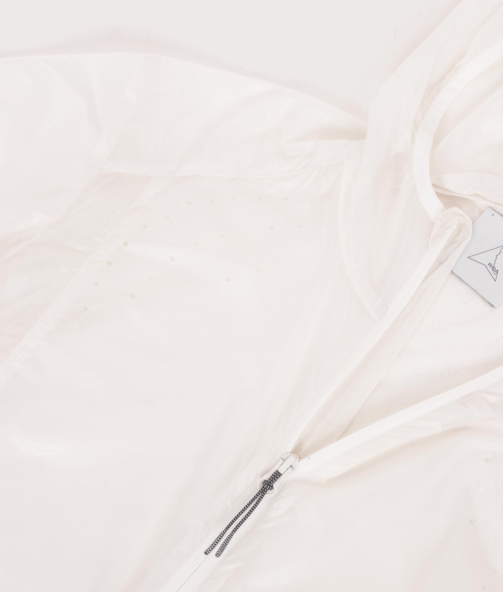 ROA Hue Packable Lightweight Windcheater in White at EQVVS Menswear. Second detail shot.