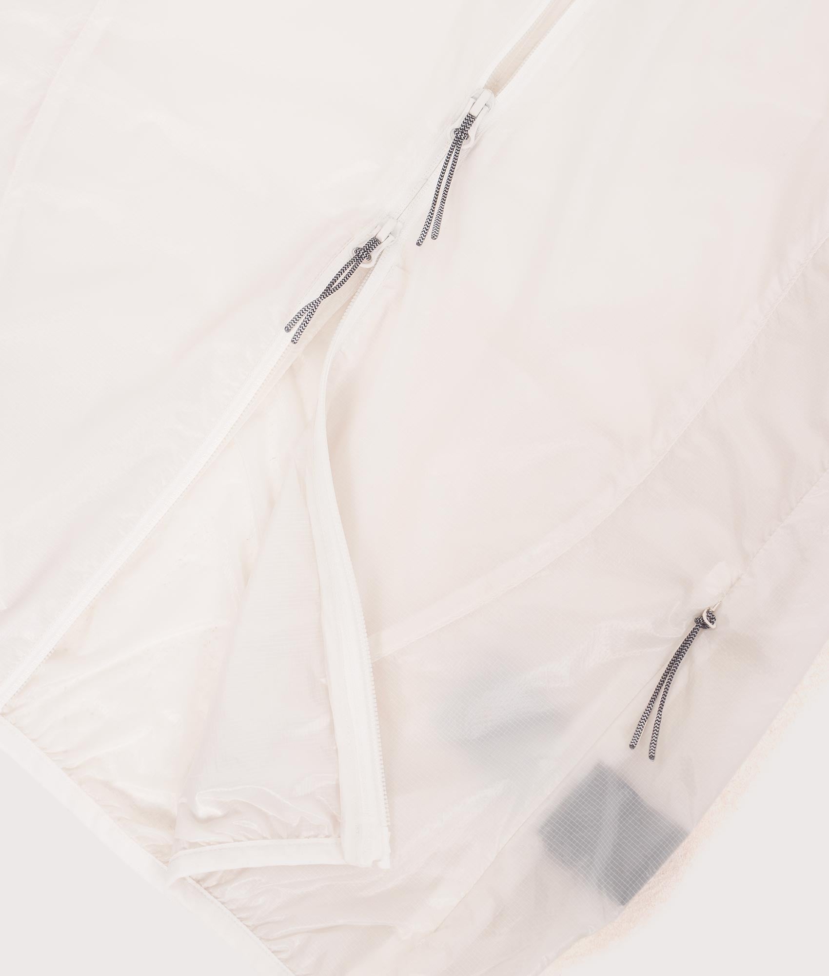 ROA Hue Packable Lightweight Windcheater in White at EQVVS Menswear. Third detail shot.