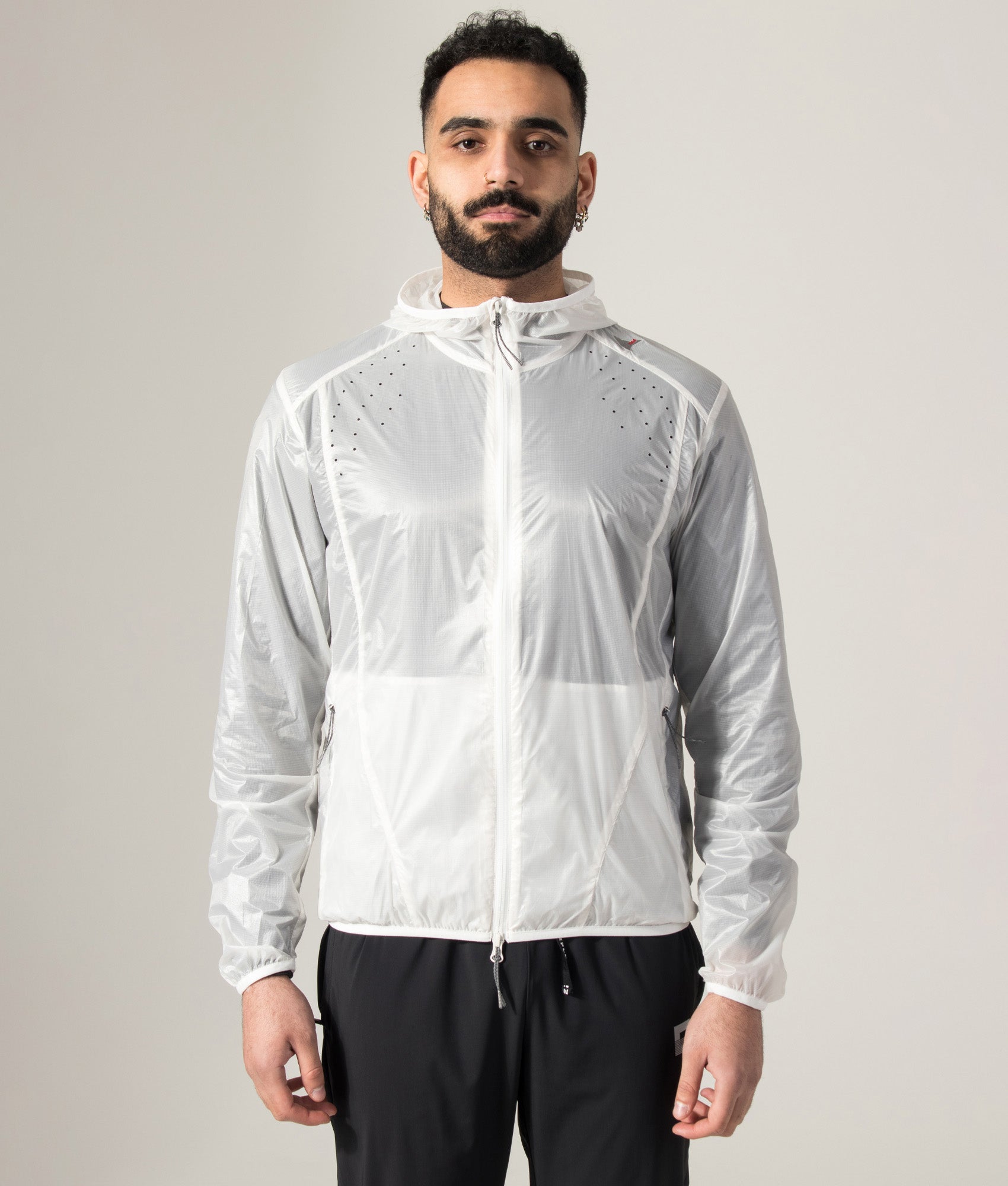 ROA Hue Packable Lightweight Windcheater in White at EQVVS Menswear. Model shot.