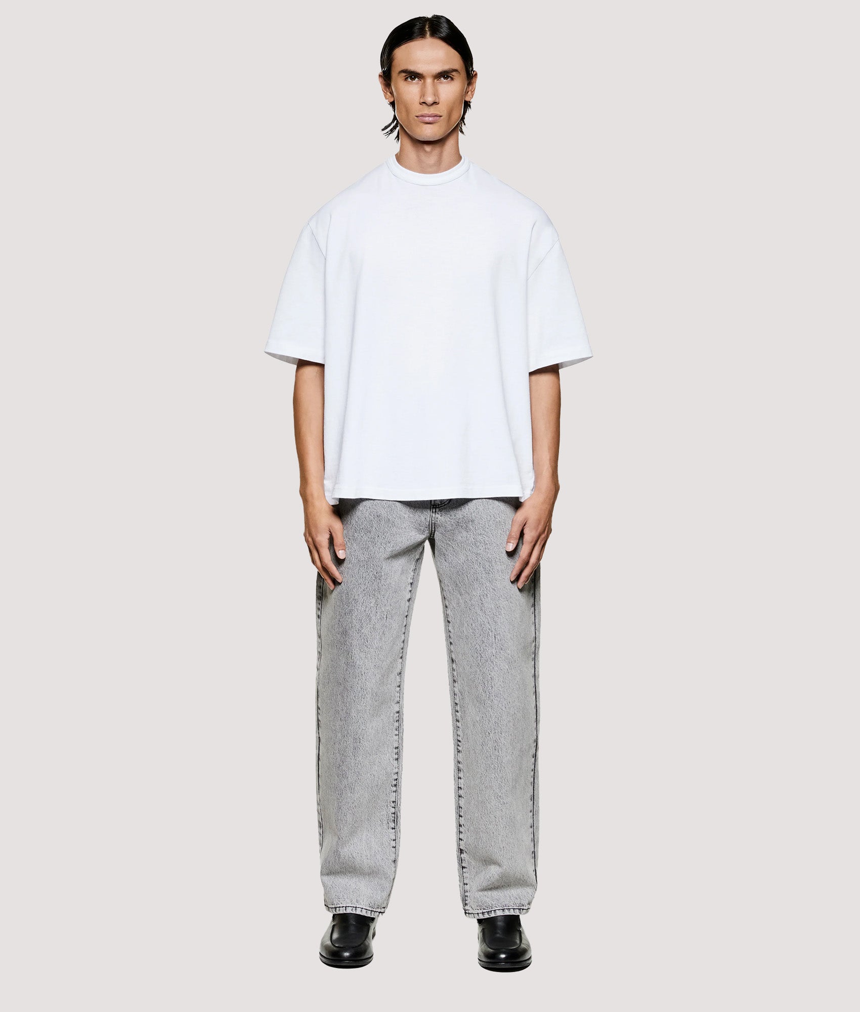 MKI MIYUKI ZOKU Box Fit 220 GSM Slub T-Shirt in White at EQVVS Menswear. Model front shot.