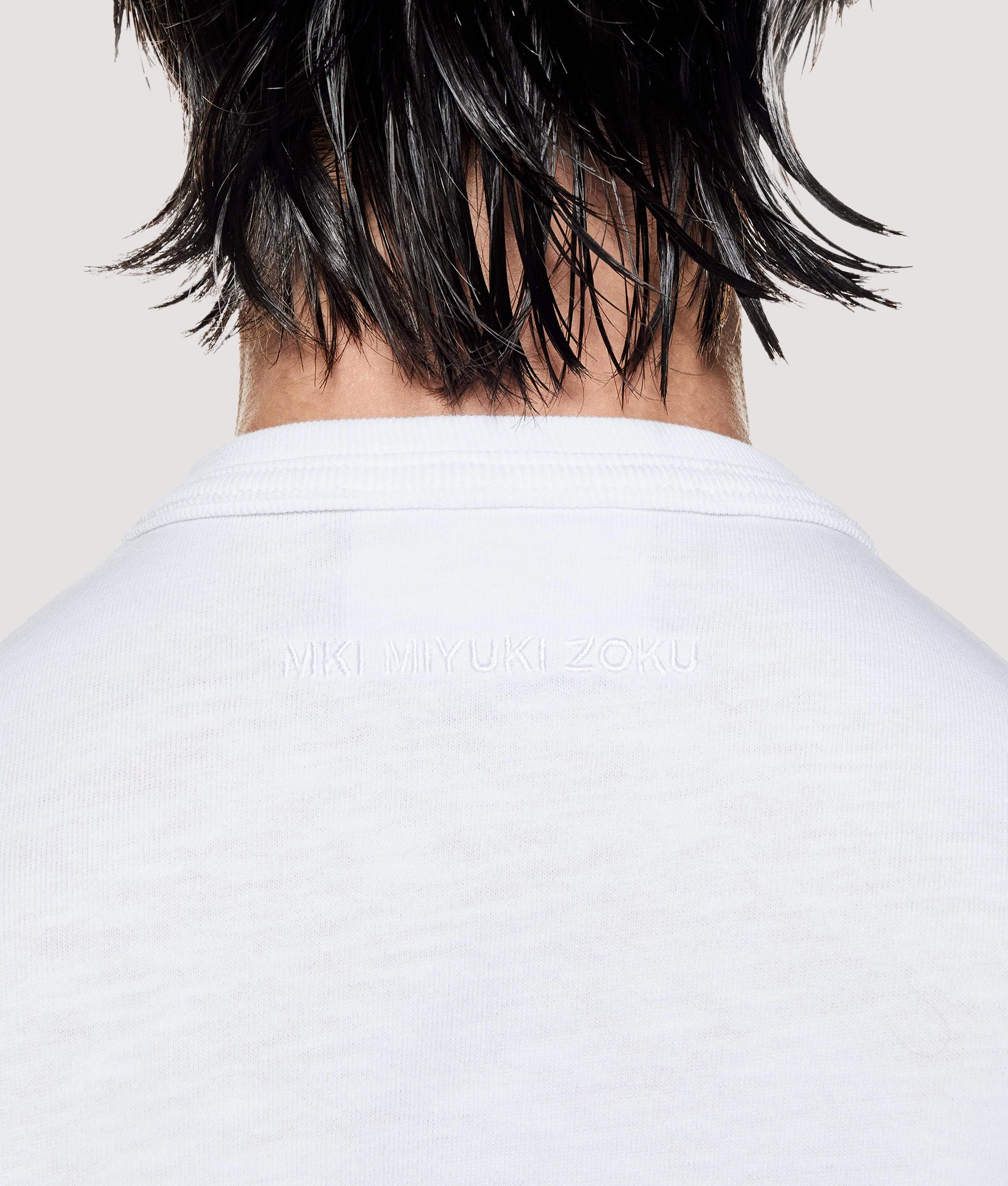 MKI MIYUKI ZOKU Box Fit 220 GSM Slub T-Shirt in White at EQVVS Menswear. Detail shot.