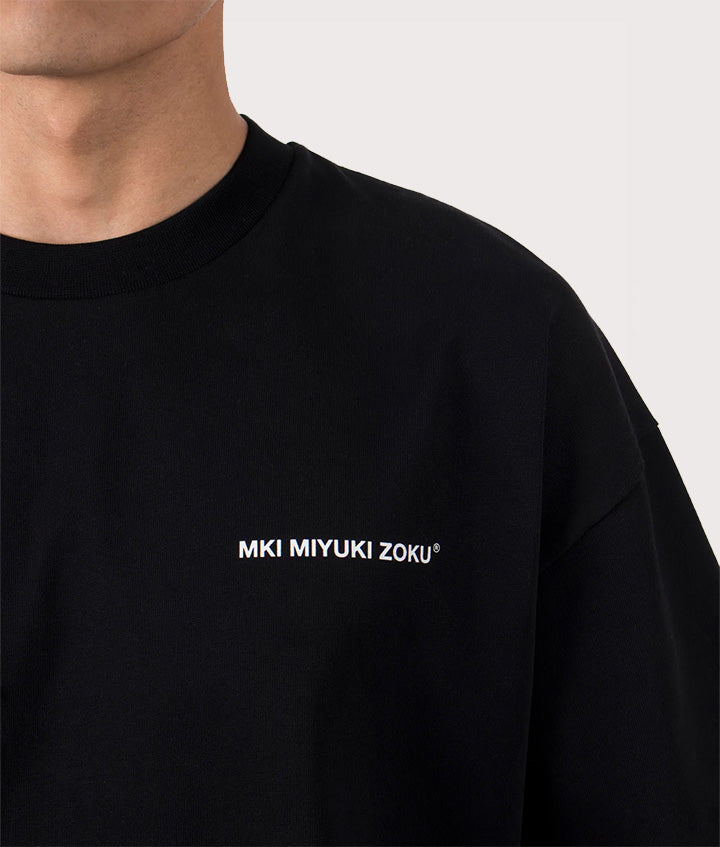 MKI MIYUKI ZOKU Oversized Uniform T-Shirt at EQVVS Menswear. Detail shot.