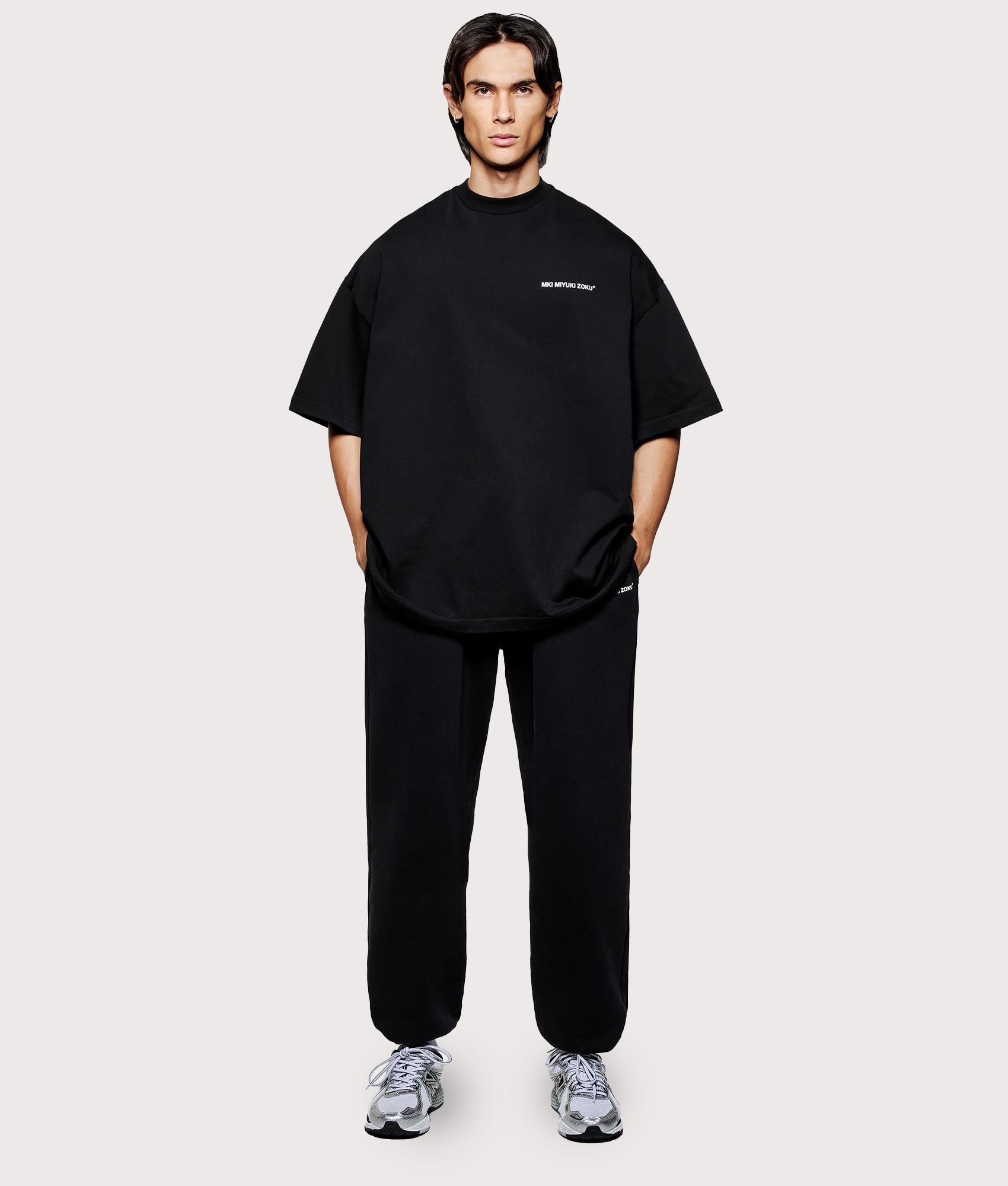 MKI MIYUKI ZOKU Oversized Uniform T-Shirt at EQVVS Menswear. Model front shot.