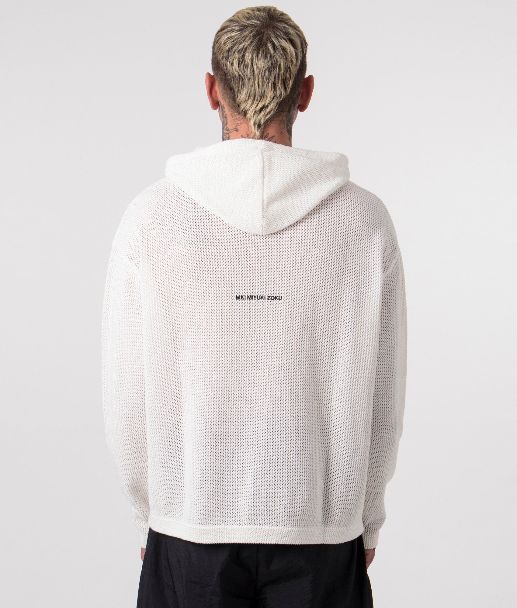 Oversized Loose Gauge Hoodie in Off White by MKI MIYUKI ZOKU. EQVVS Back Model Shot.
