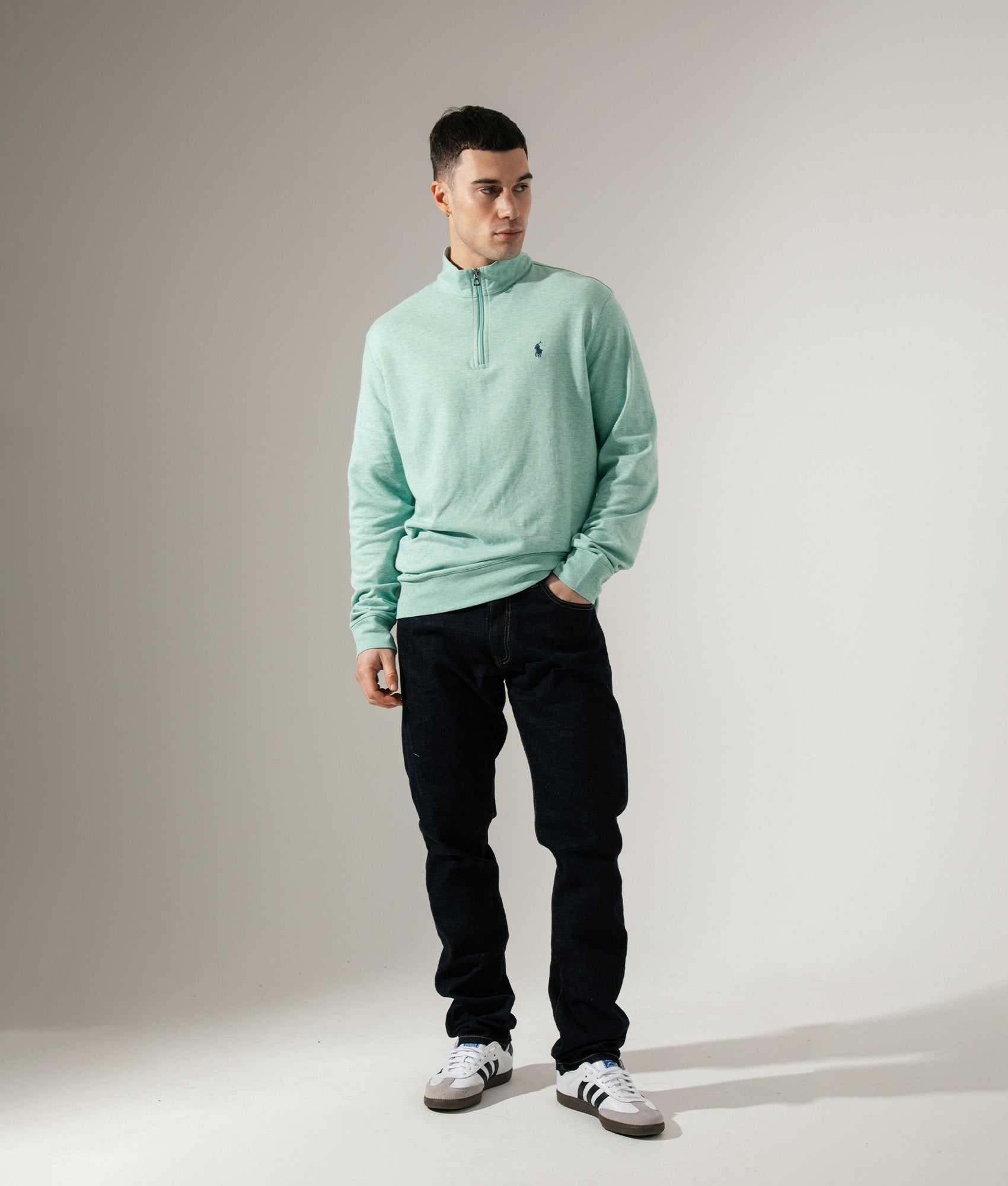 Polo Ralph Lauren Quarter Zip Sweatshirt in Celadon Heather at EQVVS Menswear. Campaign shot.