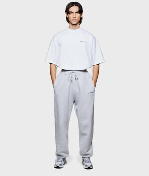 MKI Relaxed Fit Uniform Joggers in Grey.Front model shot at EQVVS.