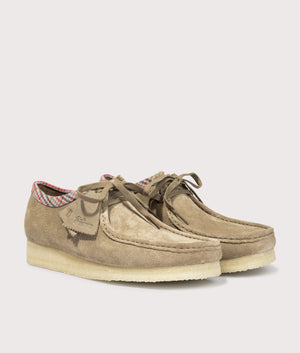 Wallabee Suede by Clarks in Taupe. Shot by EQVVS. front detail shot