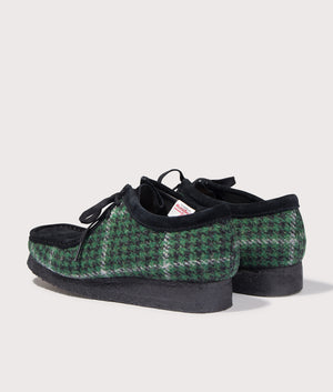 Wallabee by Clarks in Green Tweed. Shot by EQVVS. Back shot.