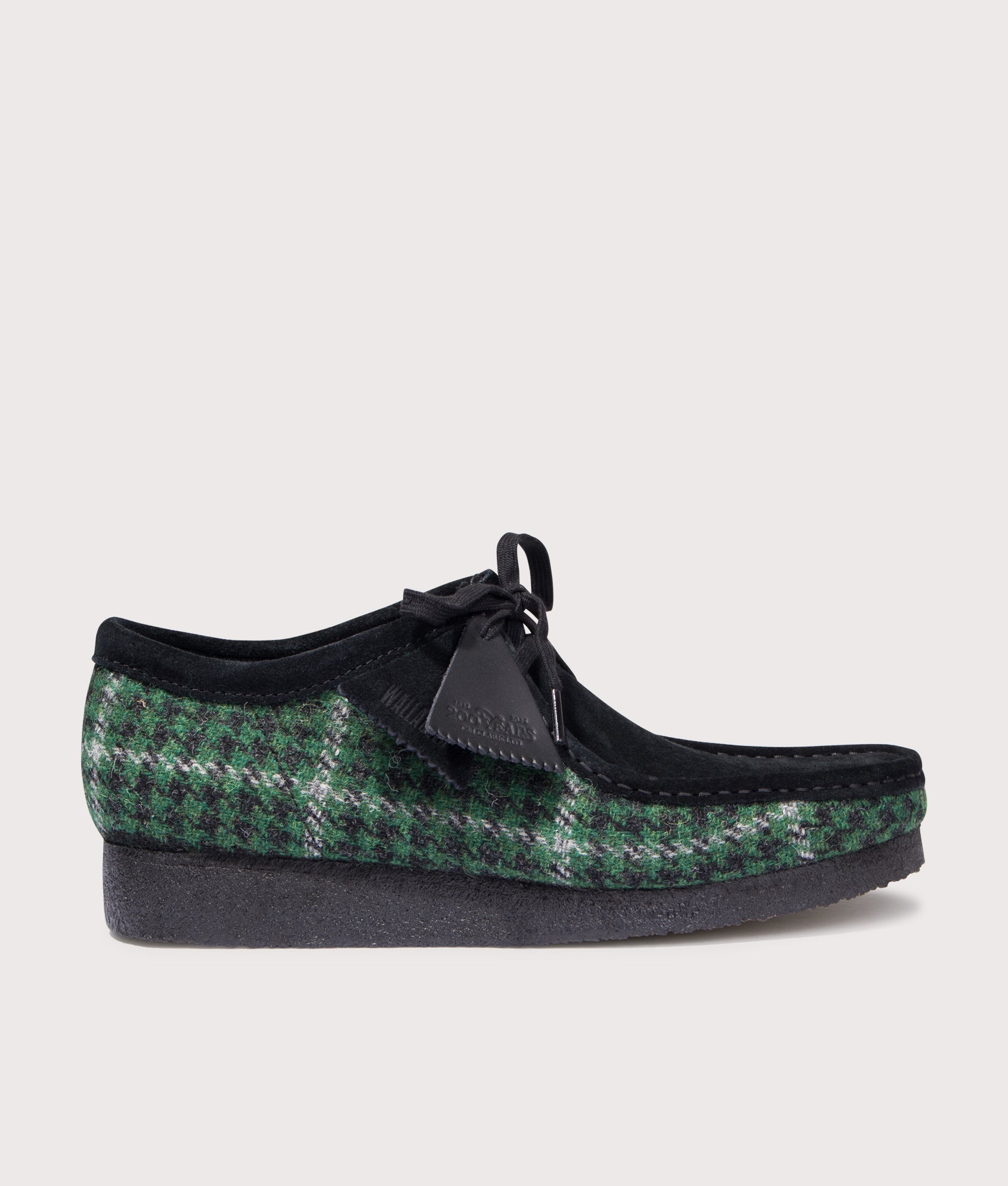 Wallabee by Clarks in Green Tweed. Shot by EQVVS. Front shot.
