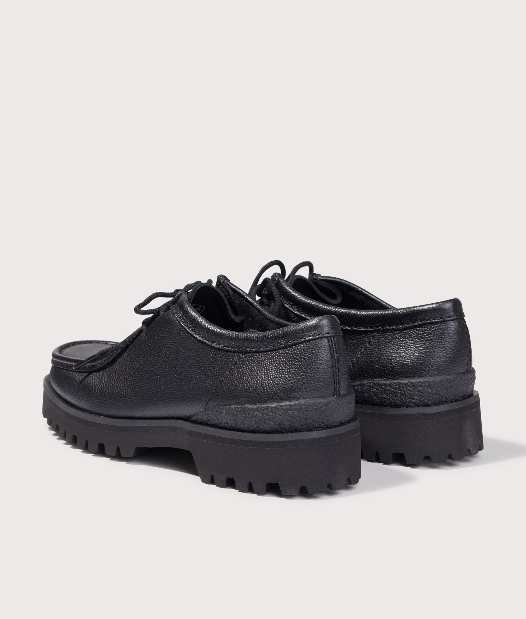 Clarks Originals Walla Yukoner Shoes in Black Scotch Grain at EQVVS Menswear. Angled back shot.