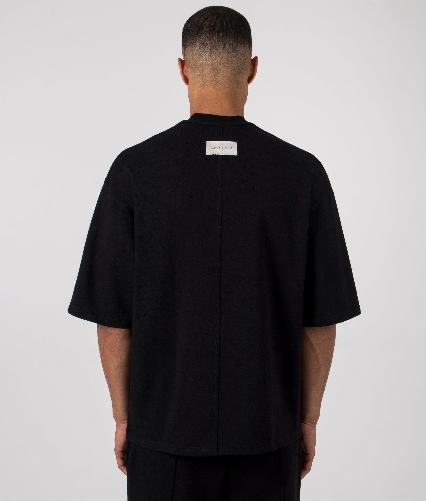 1954 Heavy T-Shirt in Black by Florence Black. EQVVS Back Angle Shot