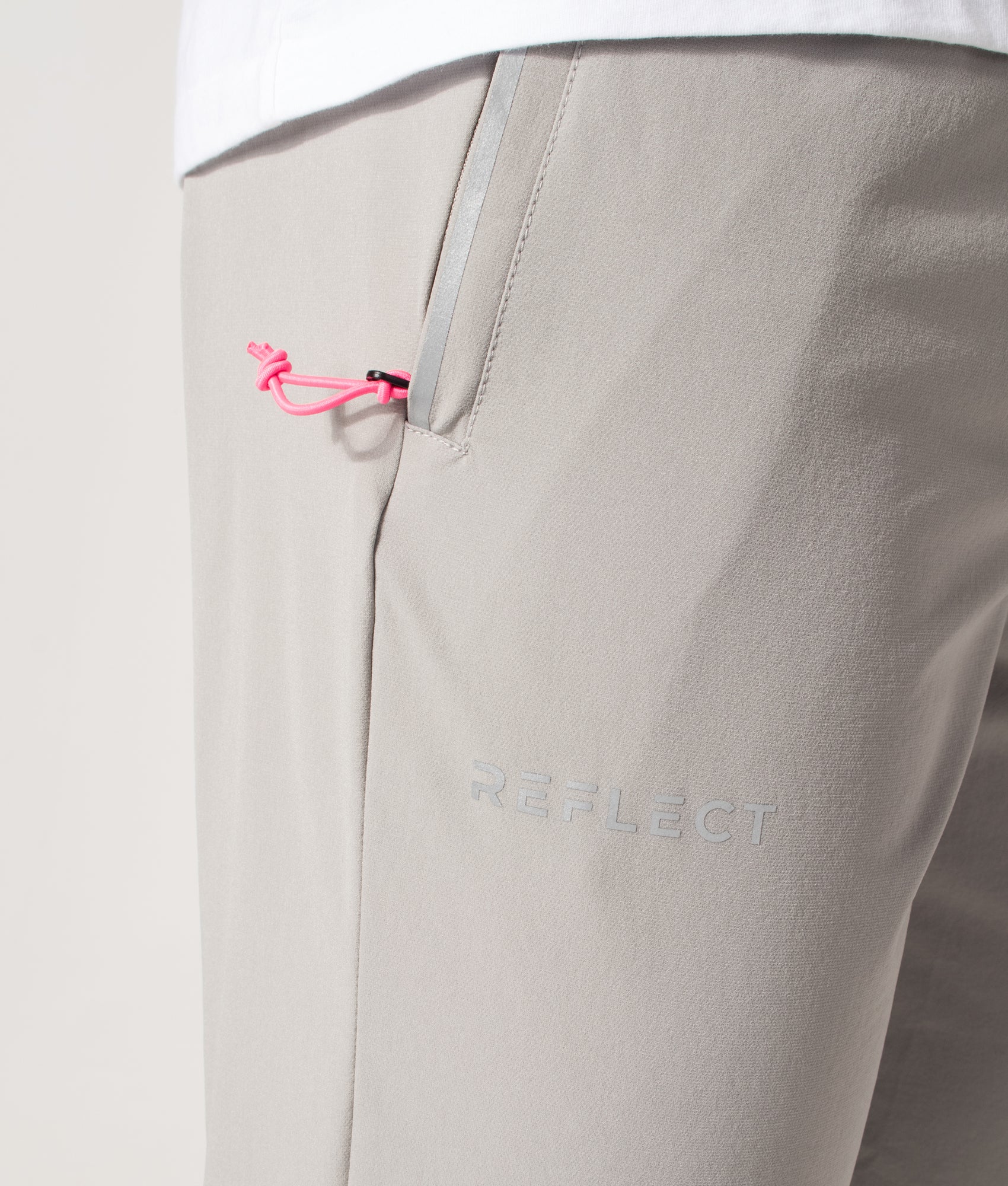 REFLECT Woven Track Pants in Grey at EQVVS Menswear. Second detail shot. 