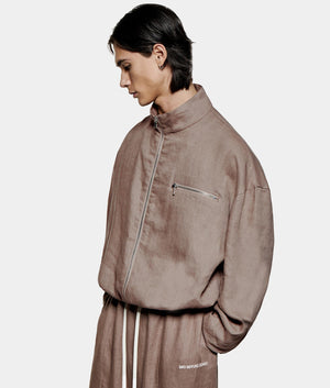 Linen Track Jacket. Shot by EQVVS. Front model angled shot.