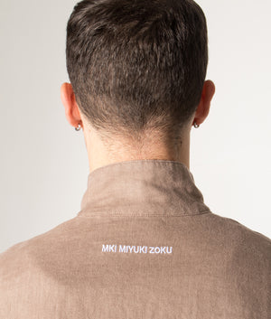 Linen Track Jacket in Mushroom. 100% Linen | MKI MIYUKI ZOKU | Shot at EQVVS | Back detail model shot 