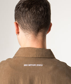 Sandwash Cupro Trucker Jacket in Brown | MKI MIYUKI ZOKU | Shot at EQVVS | Back detail model shot