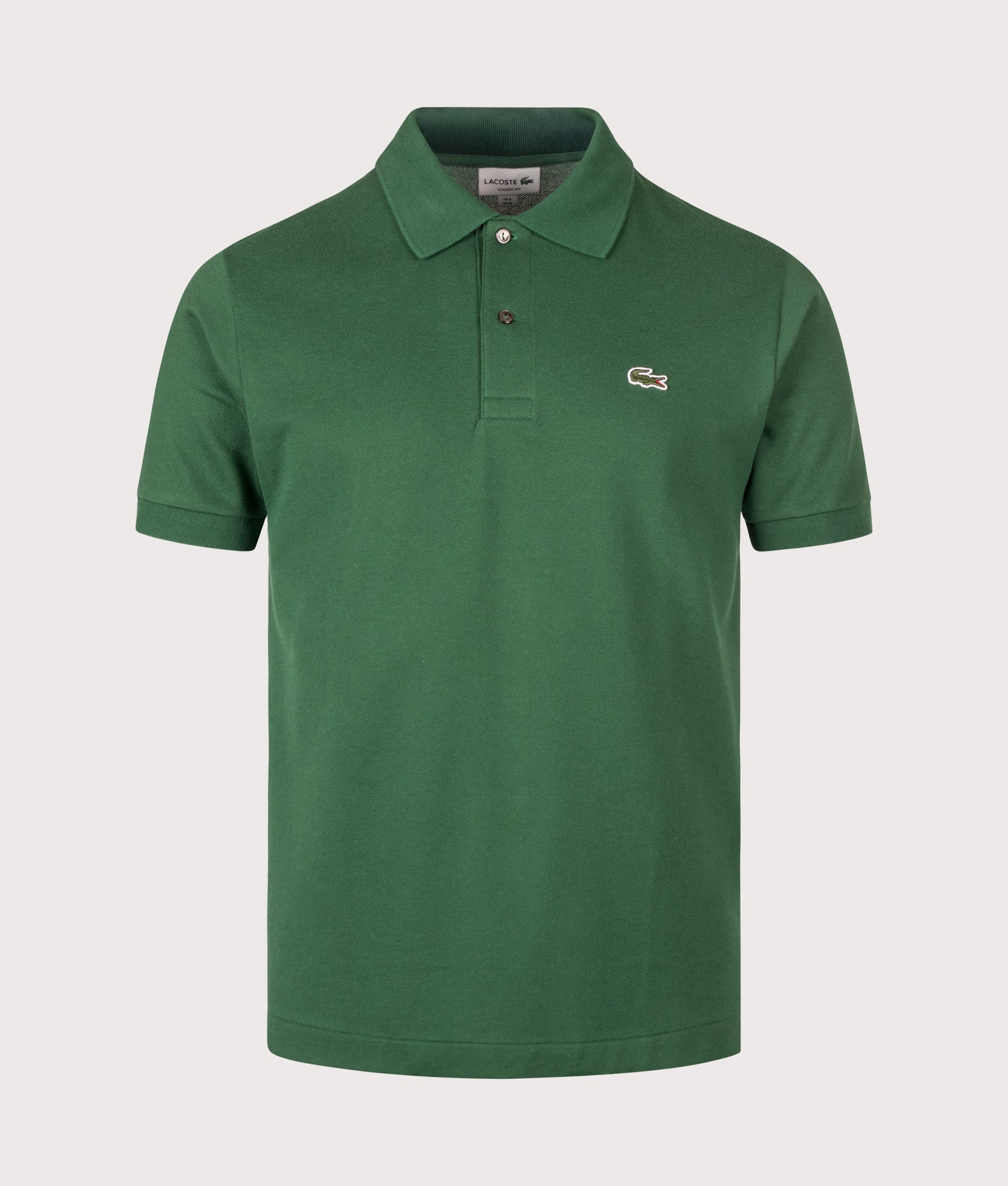 Lacoste Classic Fit L1212 Croc Logo Polo Shirt in Pine Green at EQVVS Menswear. Front shot.