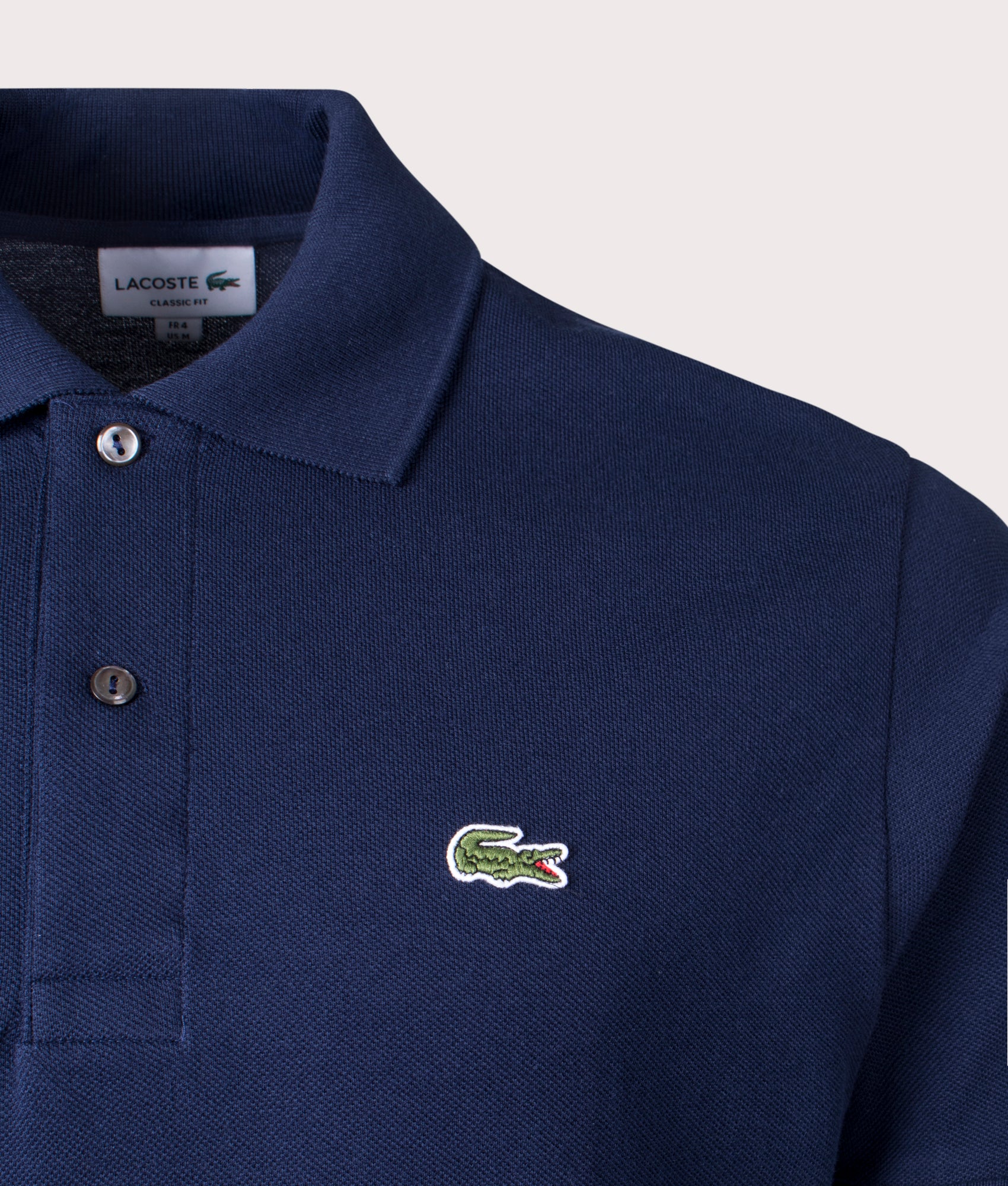 Classic Fit L1212 Croc Logo Polo Shirt in Navy. | Lacoste | Shot at EQVVS | Front detail shot
