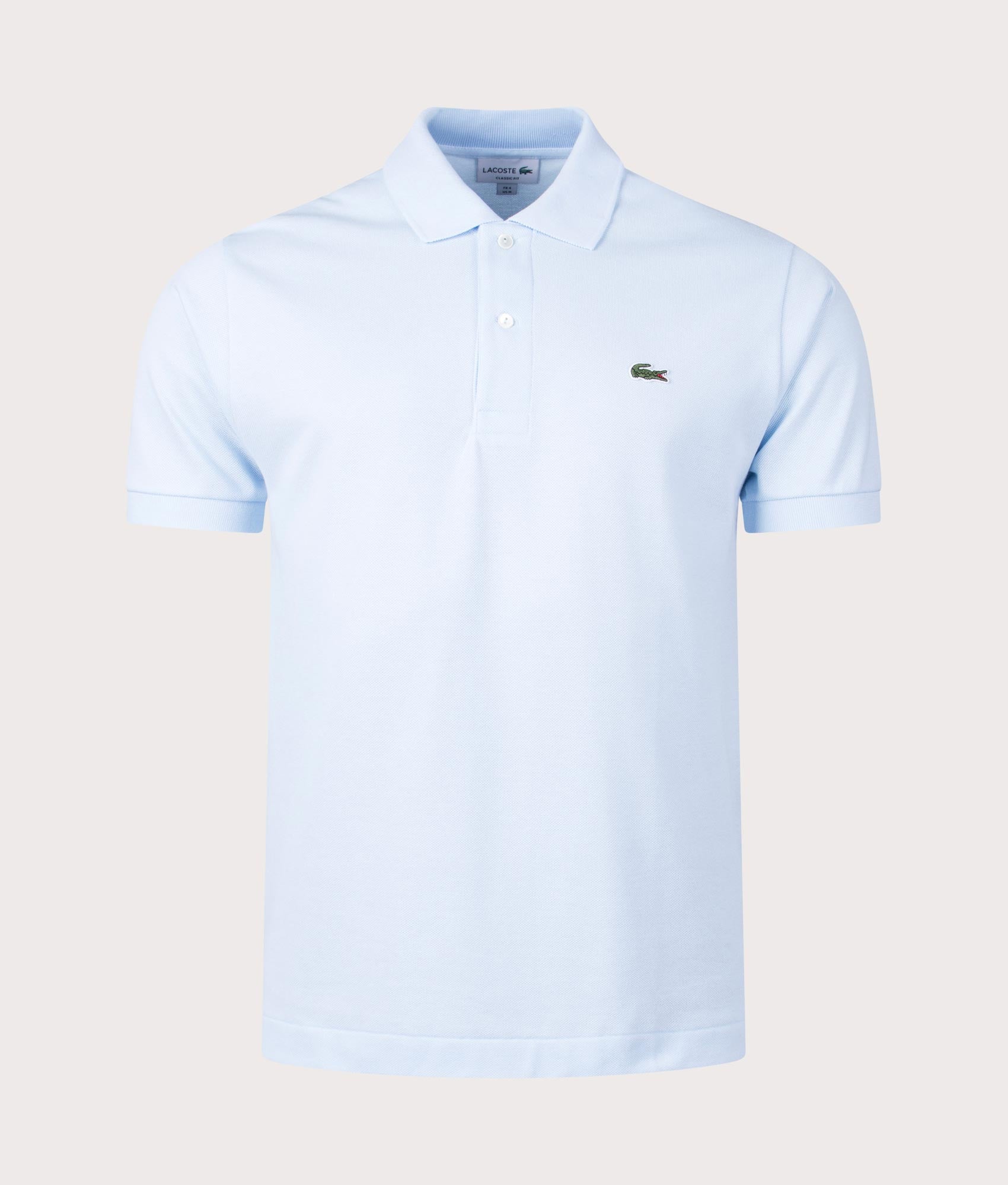 Lacoste Croc Logo L1212 Polo Shirt in Light Blue at EQVVS Menswear. Front shot.