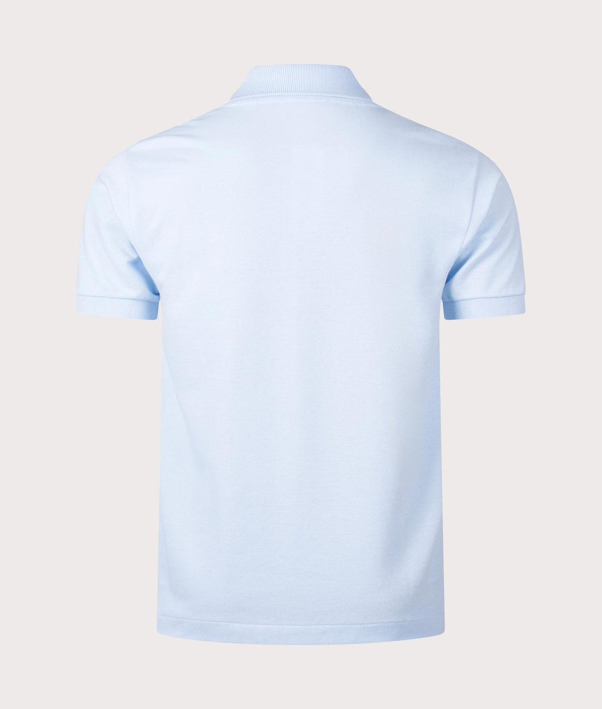 Lacoste Croc Logo L1212 Polo Shirt in Light Blue at EQVVS Menswear. Back shot.