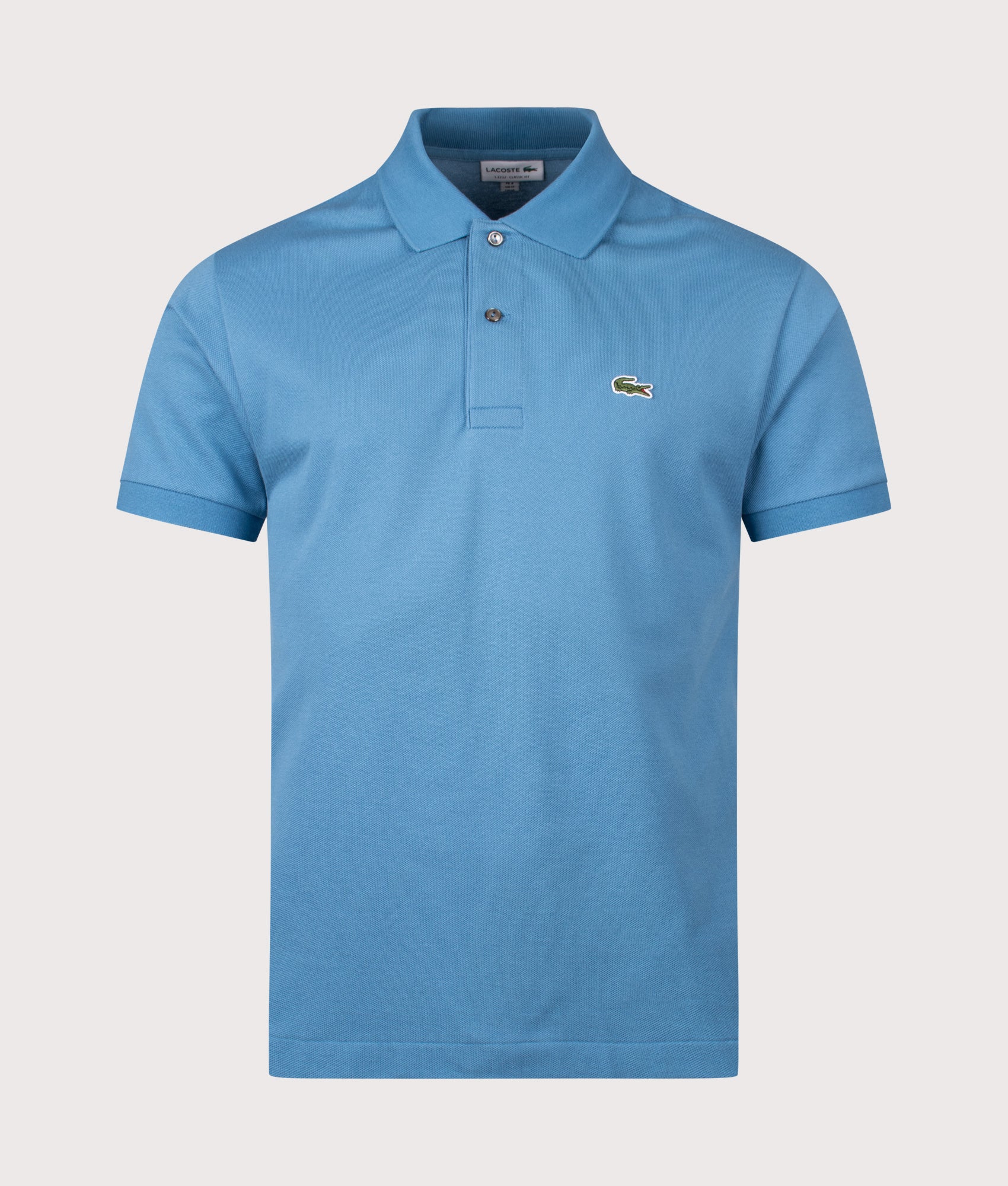 Lacoste Classic Fit L1212 Croc Logo Polo Shirt in Abyss Blue at EQVVS Menswear. Front shot. 