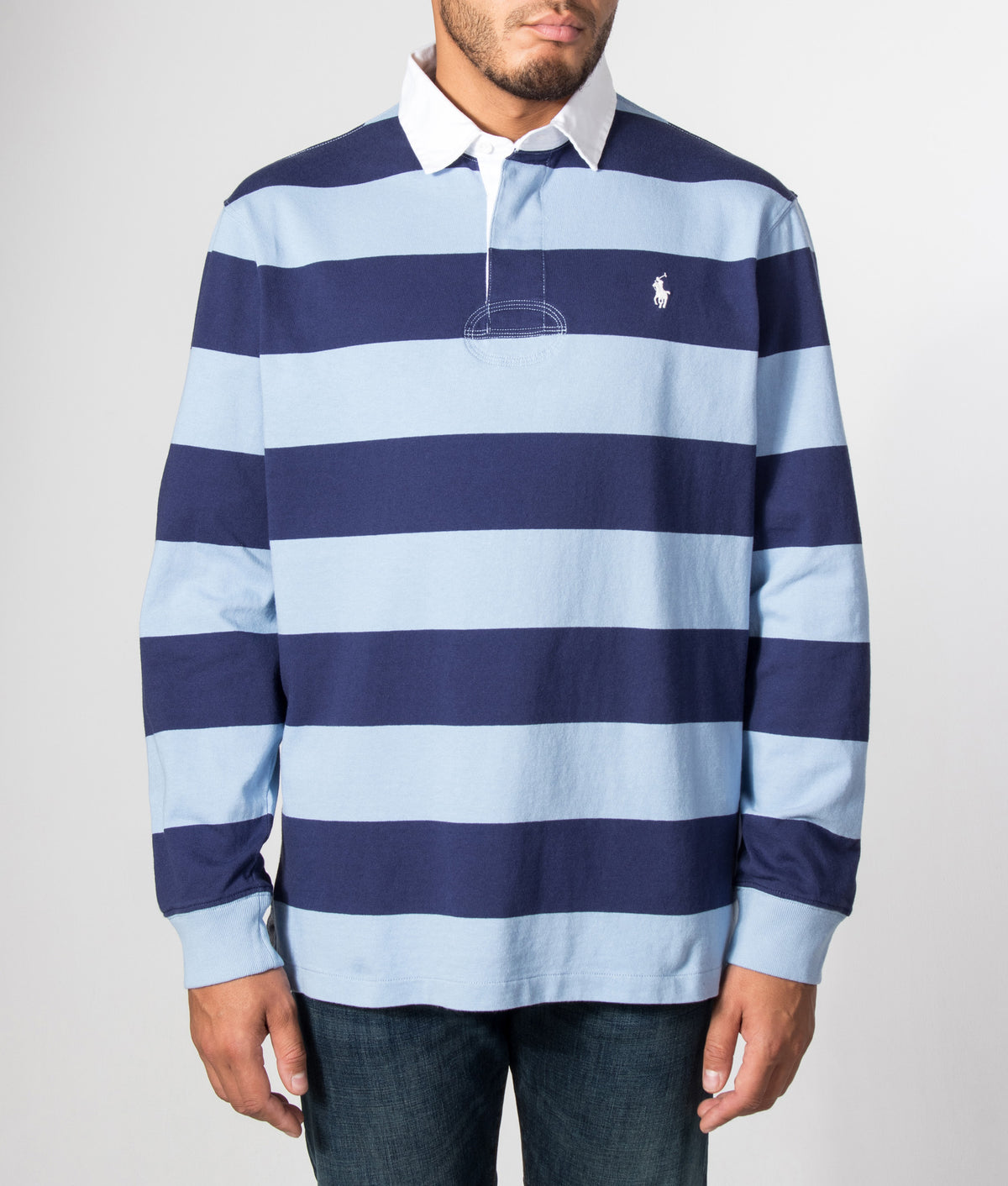 Polo Ralph Lauren Classic Fit The Iconic Striped Rugby Shirt in Chambray Blue and Balthus Navy at EQVVS Menswear. Model front shot.