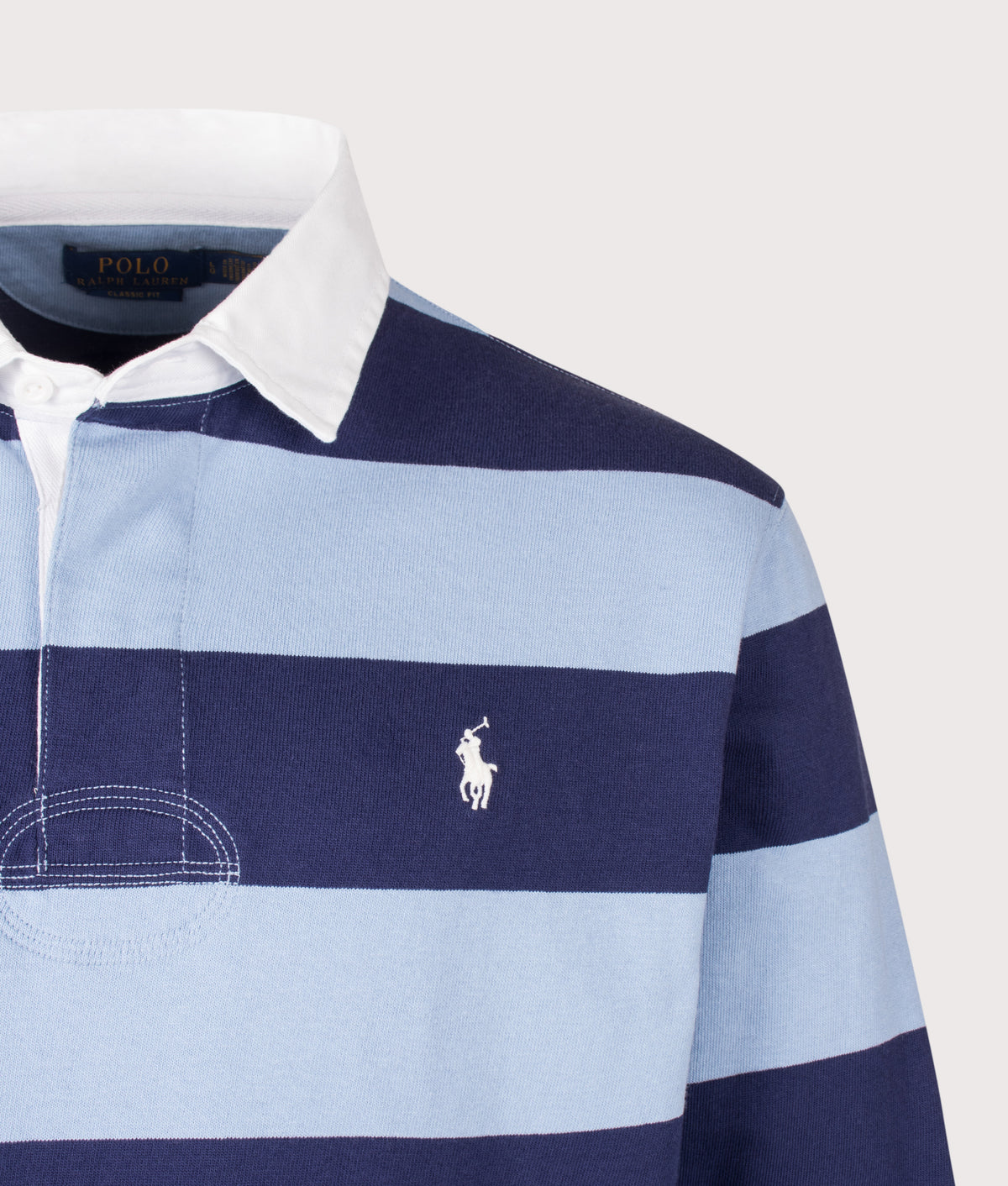 Polo Ralph Lauren Classic Fit The Iconic Striped Rugby Shirt in Chambray Blue and Balthus Navy at EQVVS Menswear. Detail shot.