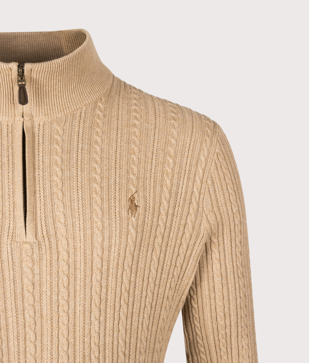 Polo Ralph Lauren Regular Fit Cable Knit Quarter Zip Jumper in Camel Melange at EQVVS Menswear. Detail shot.