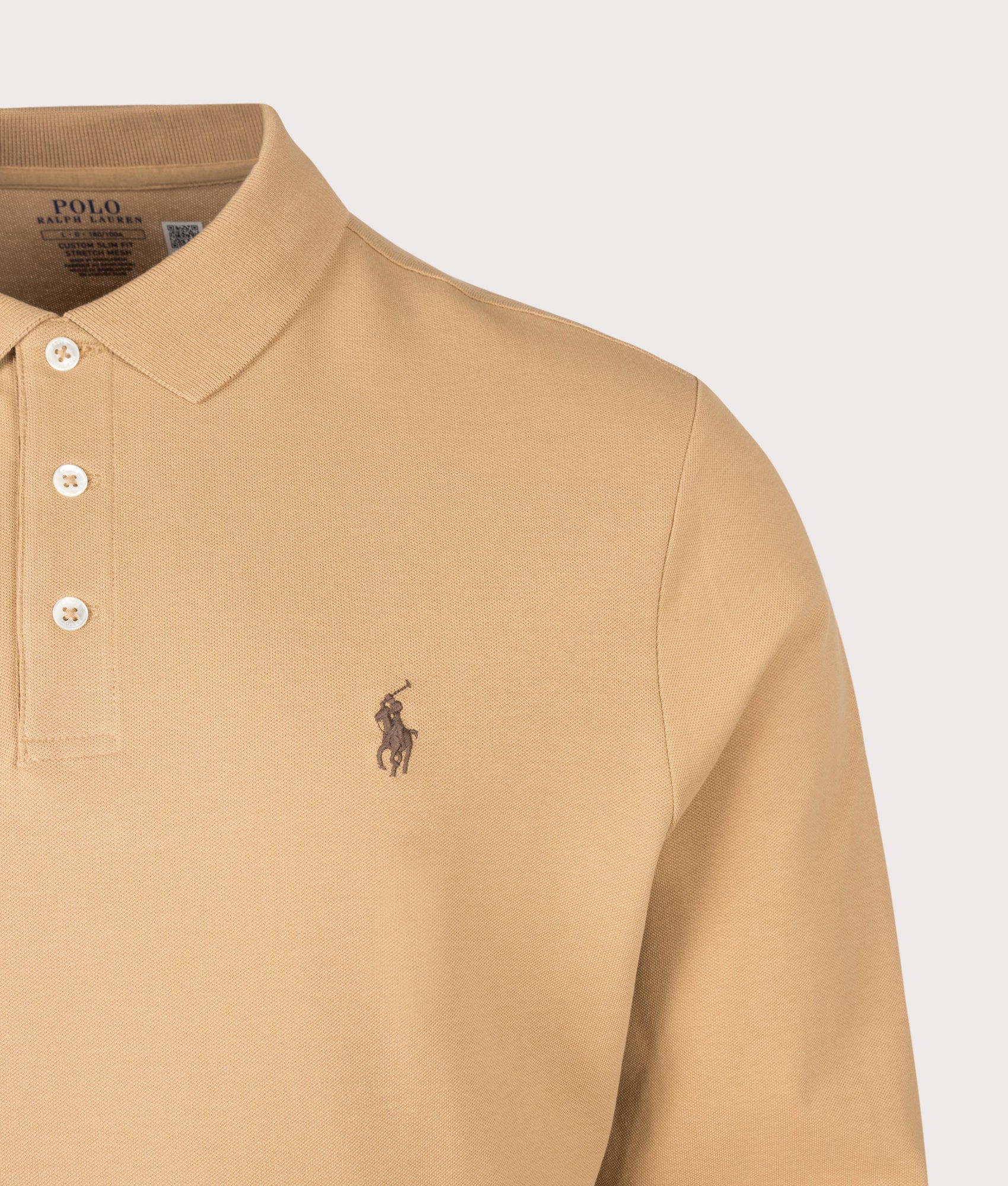 Polo Ralph Lauren Custom Slim Fit Stretch Mesh Long Sleeve Polo Shirt in Classic Camel at EQVVS Menswear. Detail shot.
