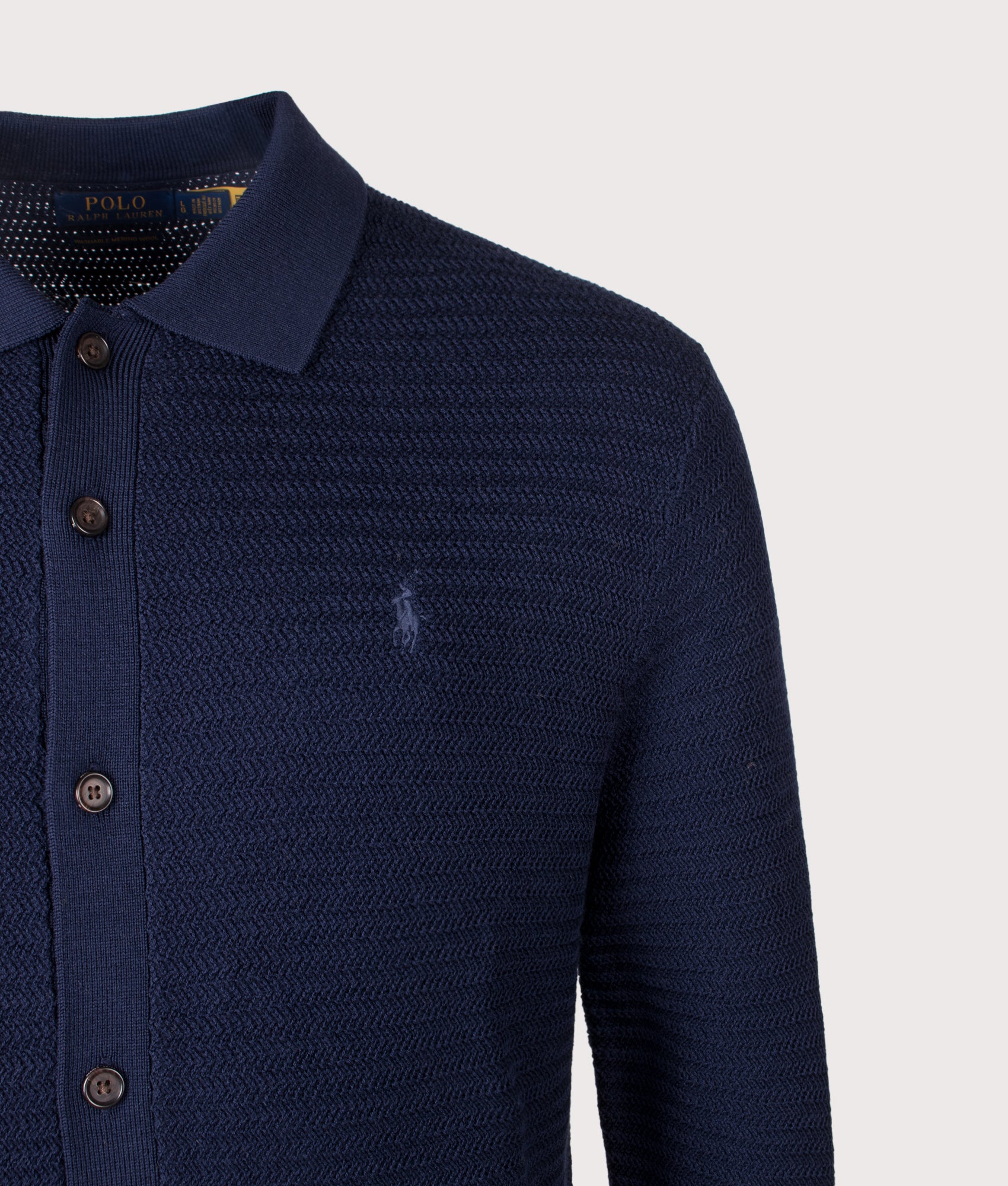 Polo Ralph Lauren Regular Fit Merino Wool Cardigan in Hunter Navy at EQVVS Menswear. Detail shot.
