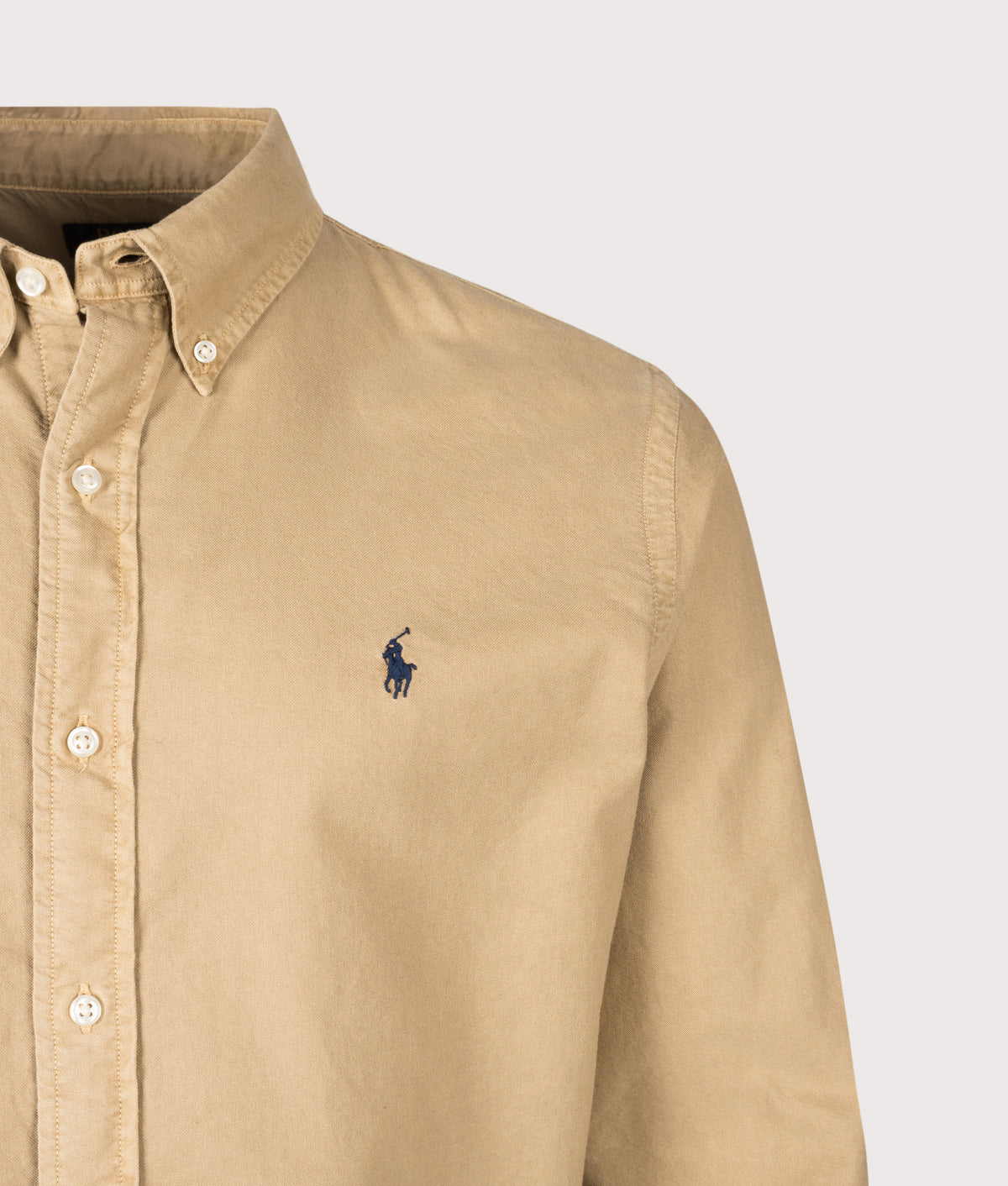 Polo Ralph Lauren Custom Fit Garment-Dyed Oxford Shirt in Classic Camel at EQVVS Menswear. Detail shot.