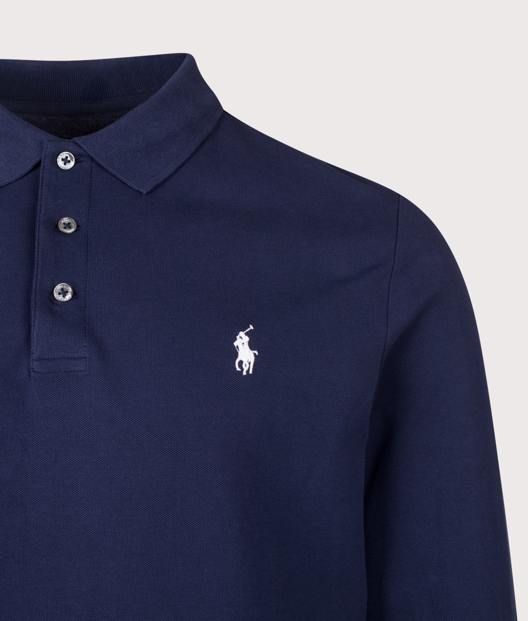 Polo Ralph Lauren Custom Slim Fit Stretch Mesh Long Sleeve Polo Shirt in Refined Navy at EQVVS Menswear. Detail shot.