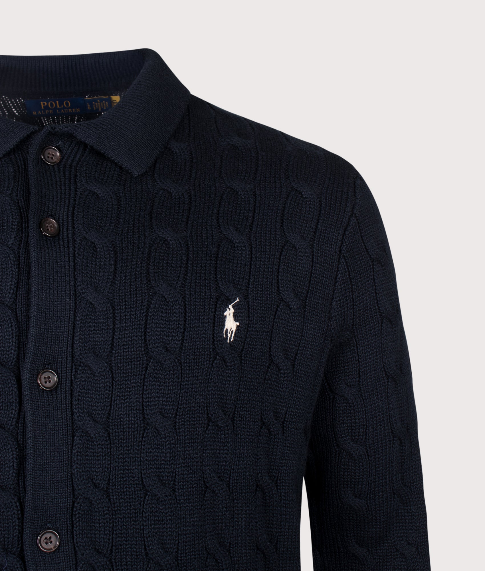 Polo Ralph Lauren Cable Knit Cotton Cardigan in Hunter Navy at EQVVS Menswear. Detail shot.