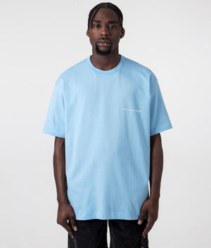 CDG Script Chest Logo T-Shirt in Blue. Front angle shot at EQVVS.