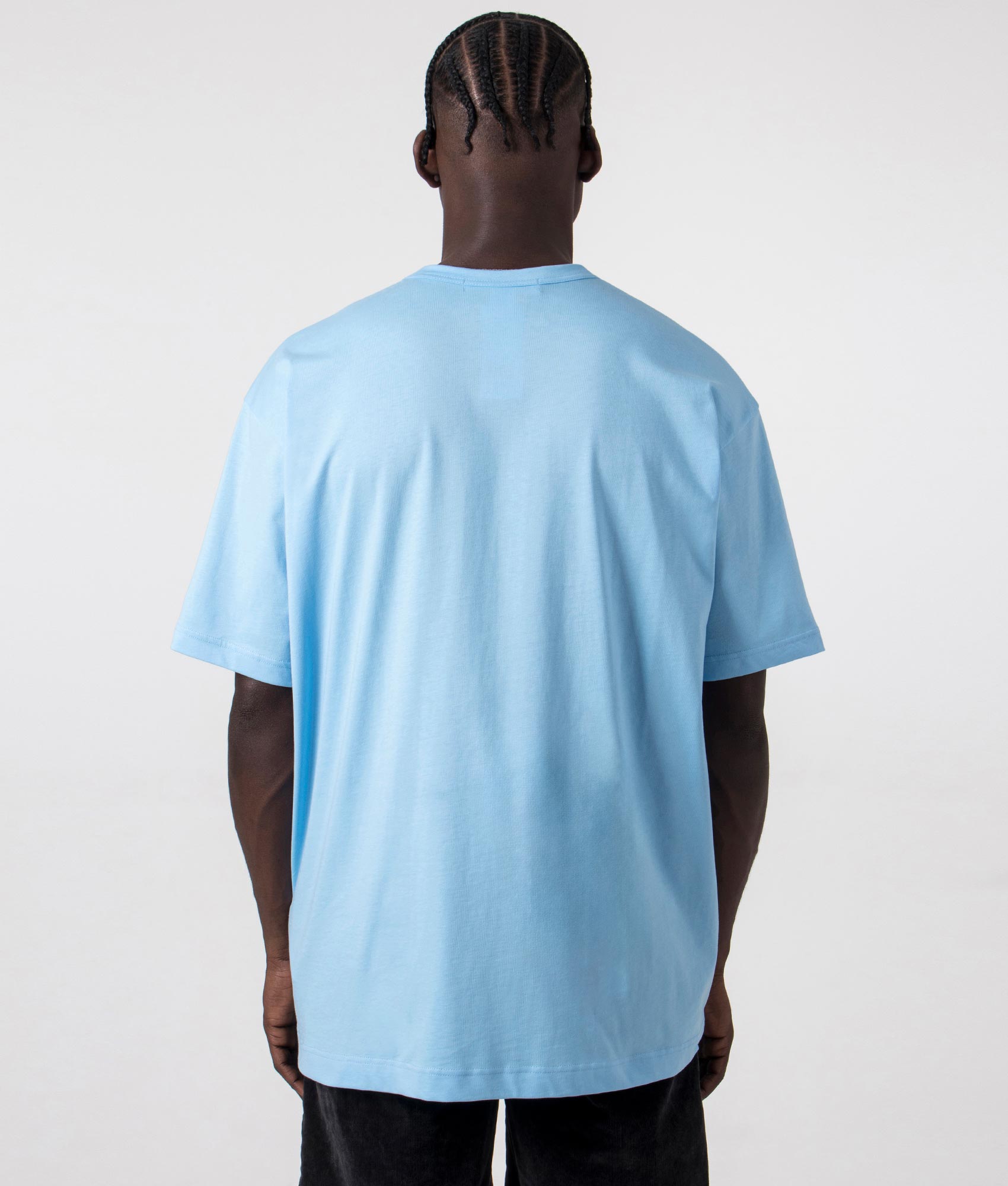 CDG Script Chest Logo T-Shirt in Blue. Back angle shot at EQVVS.