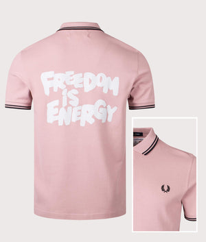 COMME des GARÇONS x Fred Perry Freedom is Energy Polo Shirt. Shot by EQVVS. Front/detail shot.