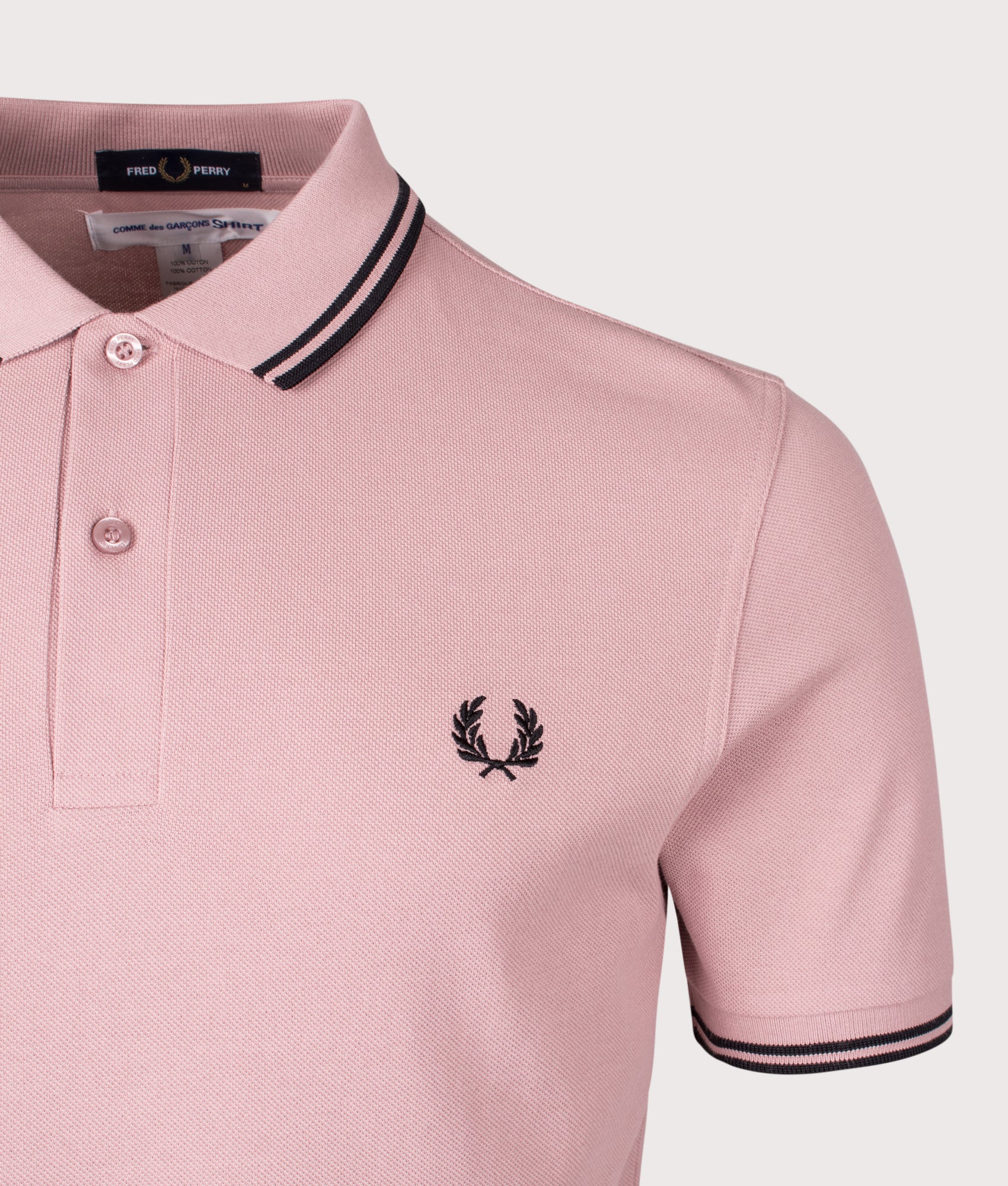 COMME des GARÇONS x Fred Perry Freedom is Energy Polo Shirt. Shot by EQVVS. Detail shot.