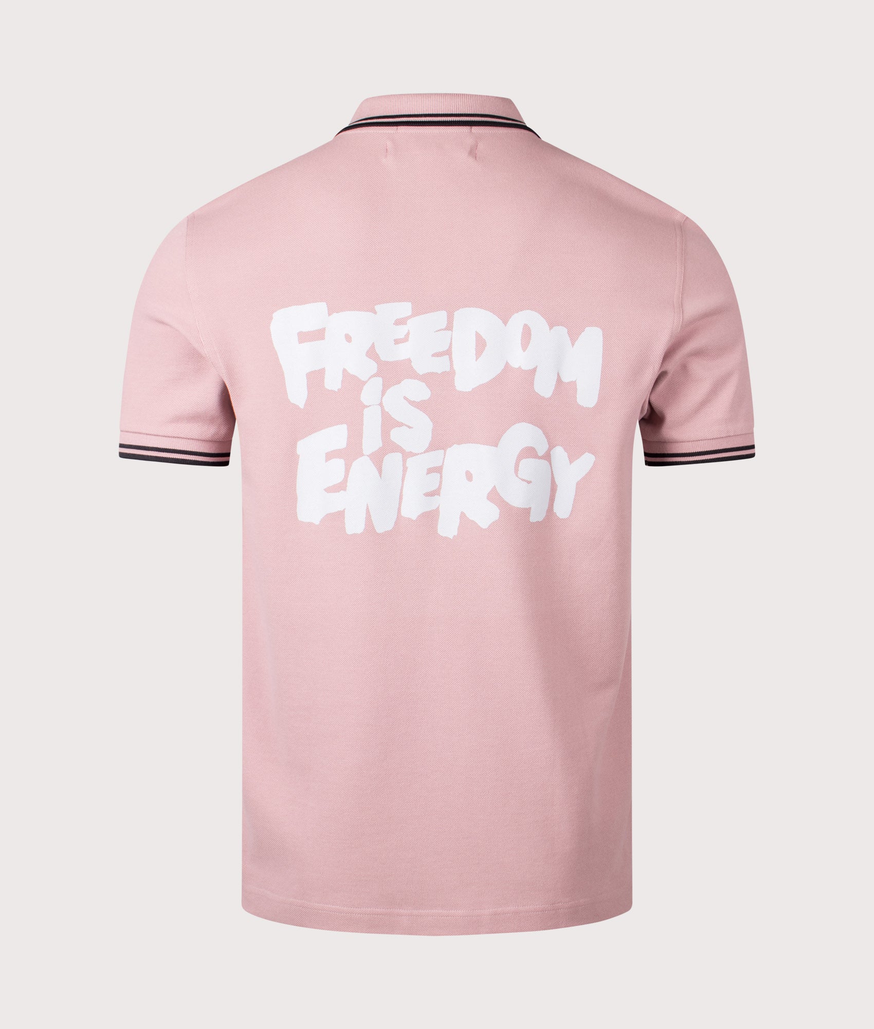 COMME des GARÇONS x Fred Perry Freedom is Energy Polo Shirt. Shot by EQVVS. Back shot.