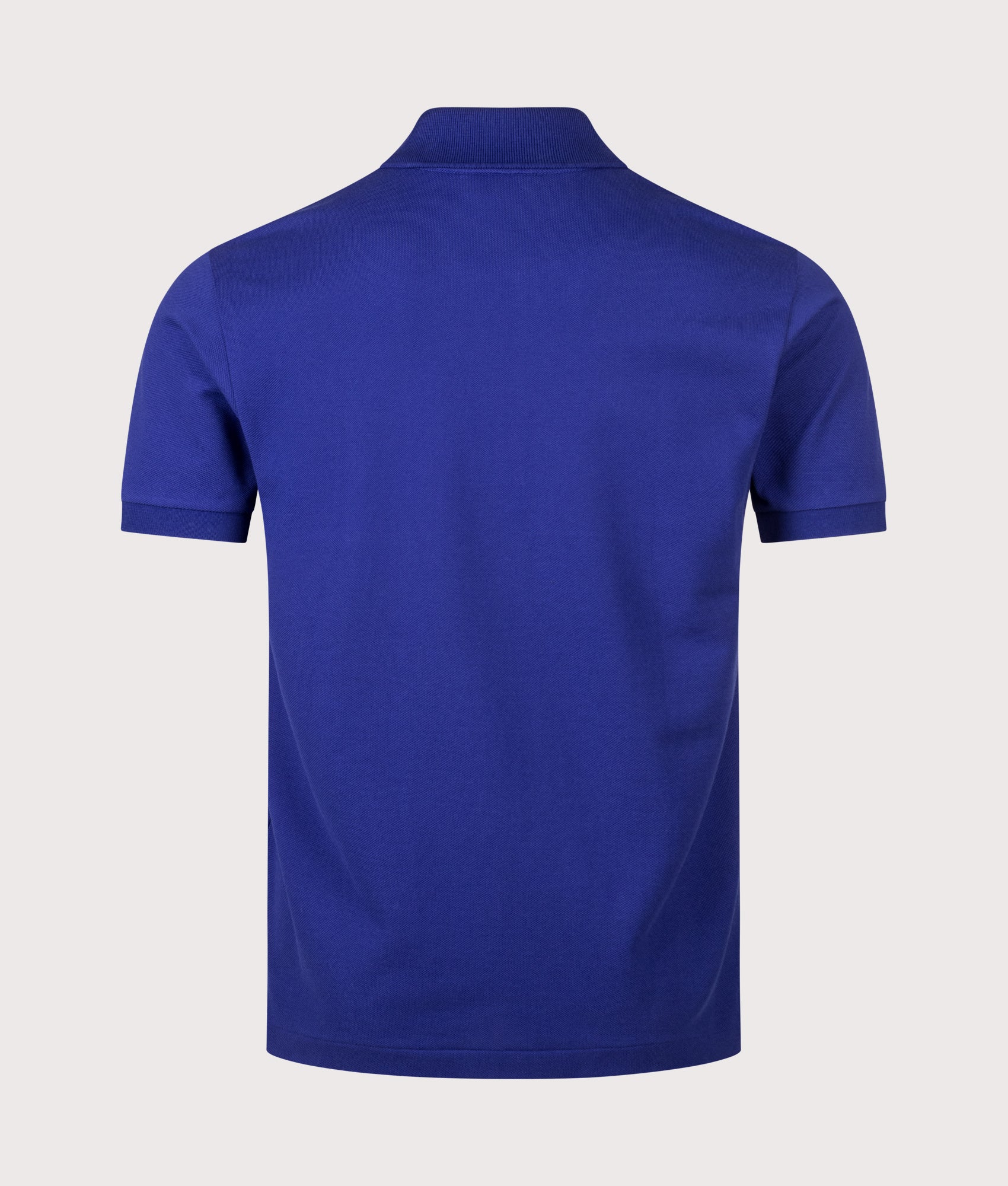 Lacoste Classic Fit L1212 Croc Logo Polo Shirt in Indigo Blue at EQVVS Menswear. Back shot.