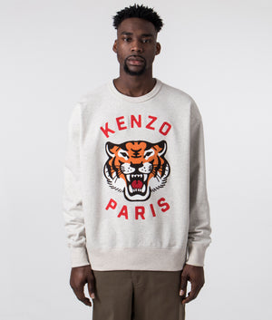 Discover the KENZO Lucky Tiger Embroidered Sweatshirt in Pale Grey with Front Print, 100% Cotton Front Model Shot at EQVVS