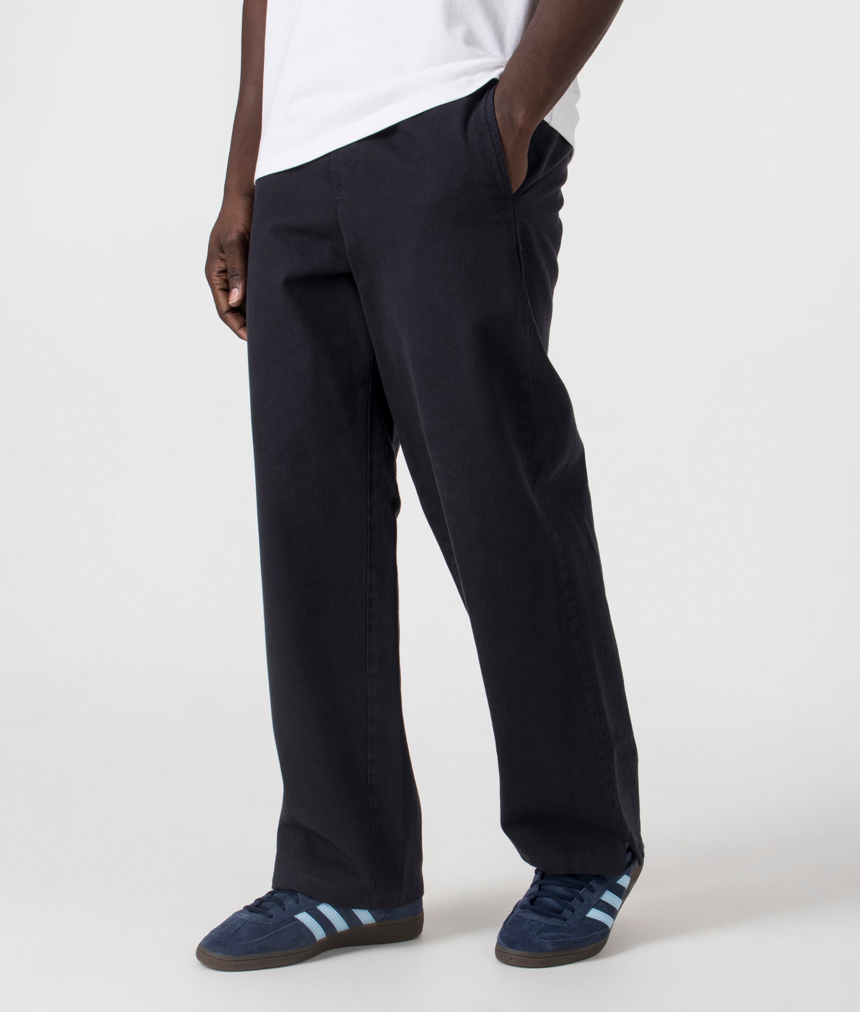 A.P.C. Vincent Pants in Navy. Shot at EQVVS. Side angle shot. 