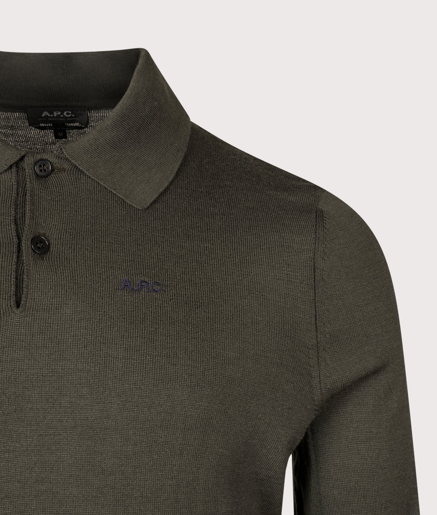 A.P.C Marcelin Polo Shirt in Dark Green at EQVVS Menswear. Detail shot.