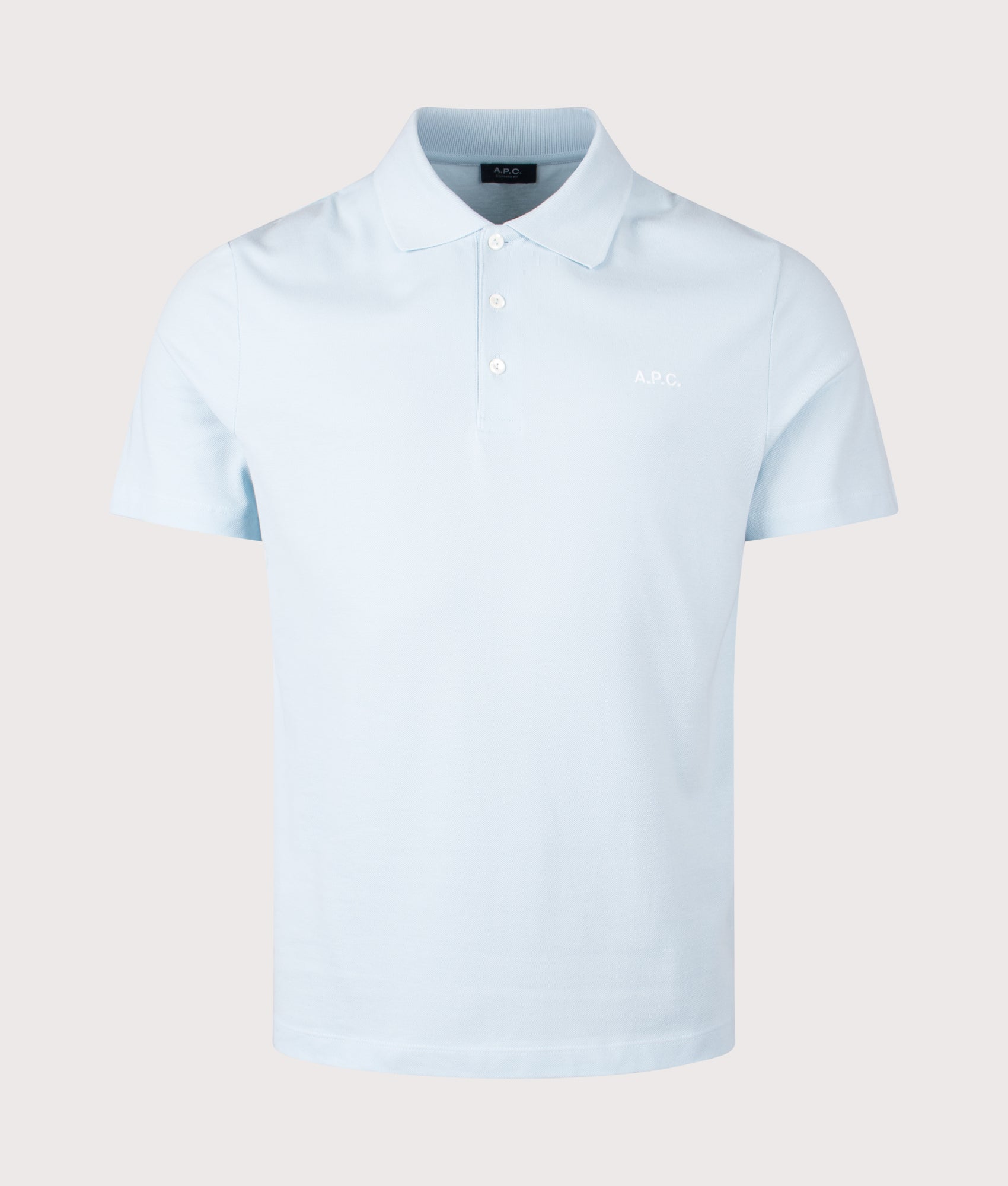 A.P.C. Relaxed Fit Standard Polo Shirt in Sky Blue at EQVVS Menswear. Front shot.