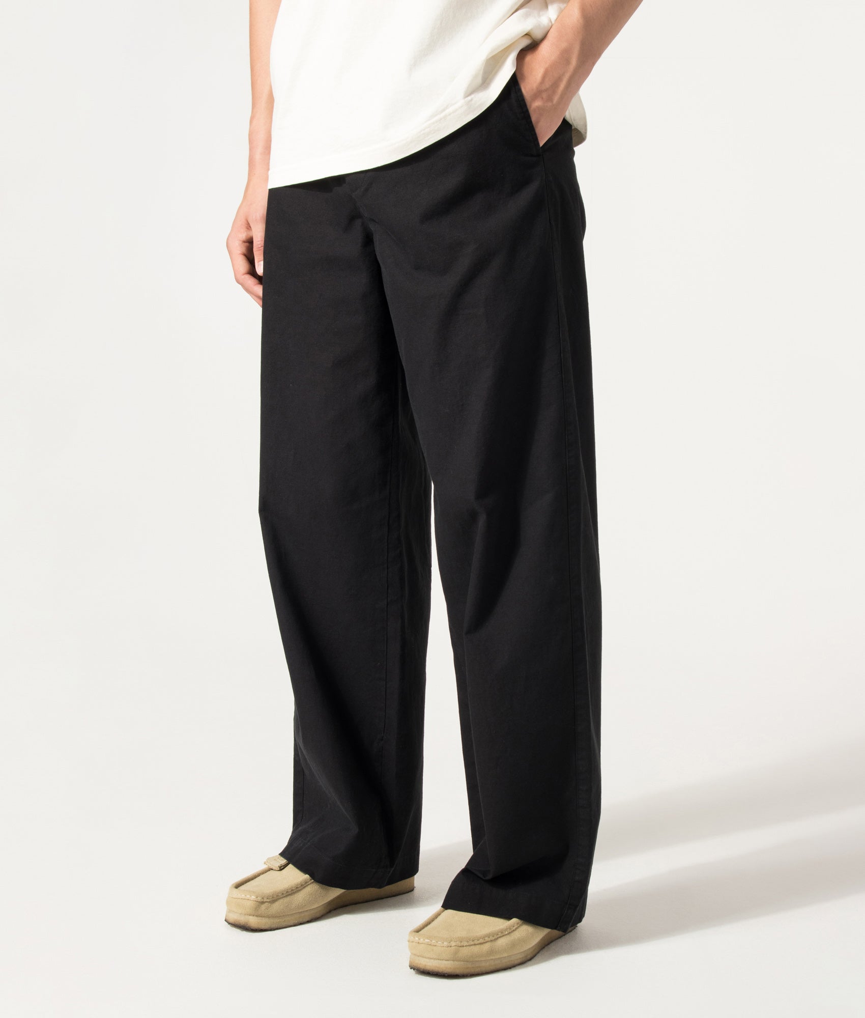A.P.C. Lou Pants in False Black at EQVVS Menswear. Angled front shot.