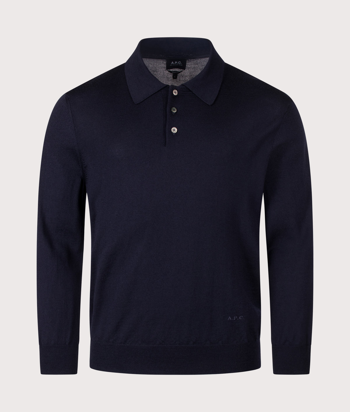 A.P.C. Regular Fit Knitted Long Sleeve Riou Polo Shirt in Dark Navy at EQVVS Menswear. Front shot.