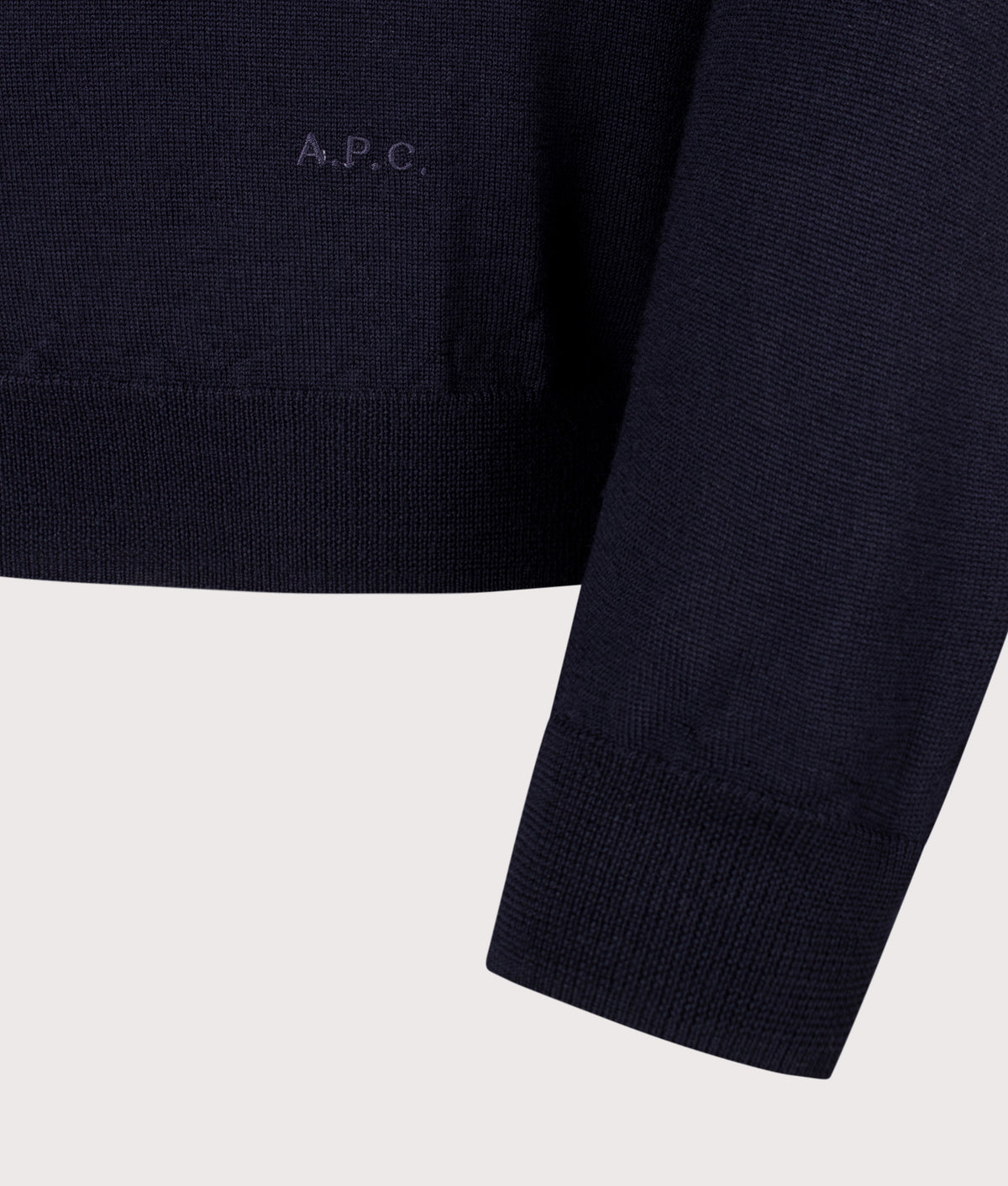A.P.C. Regular Fit Knitted Long Sleeve Riou Polo Shirt in Dark Navy at EQVVS Menswear. Detail shot.