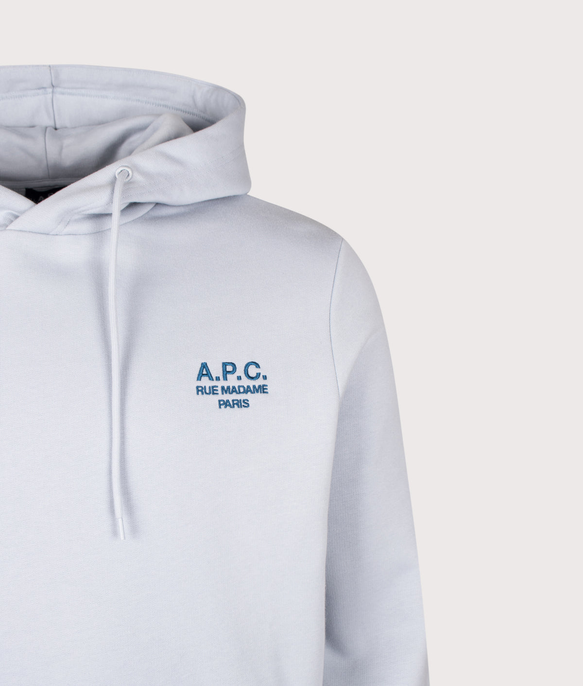 A.P.C. Regular Fit Rue Madame GOTS Hoodie in Light Blue and Dark Blue at EQVVS Menswear. Detail shot.