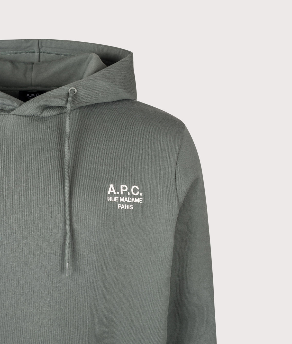 A.P.C. Regular Fit Rue Madame GOTS Hoodie in Grey-green and White at EQVVS Menswear. Detail shot.