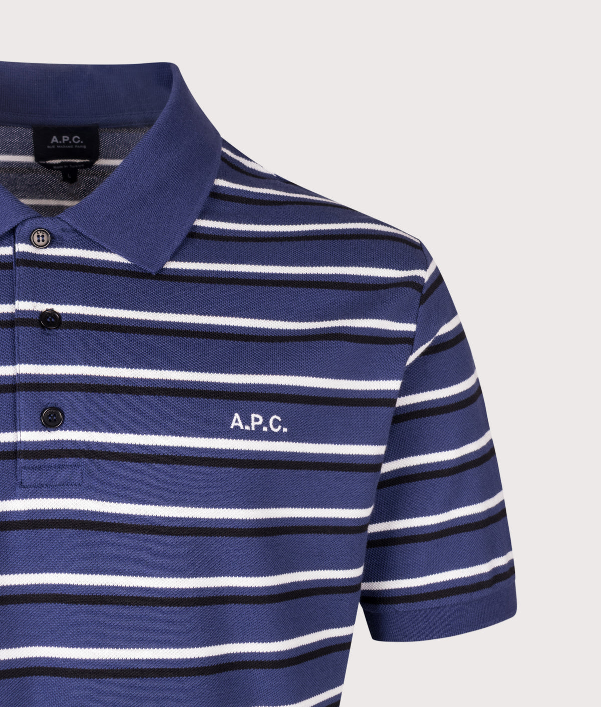 A.P.C. Regular Fit Joe Polo Shirt in Dark Blue at EQVVS Menswear. Detail shot.